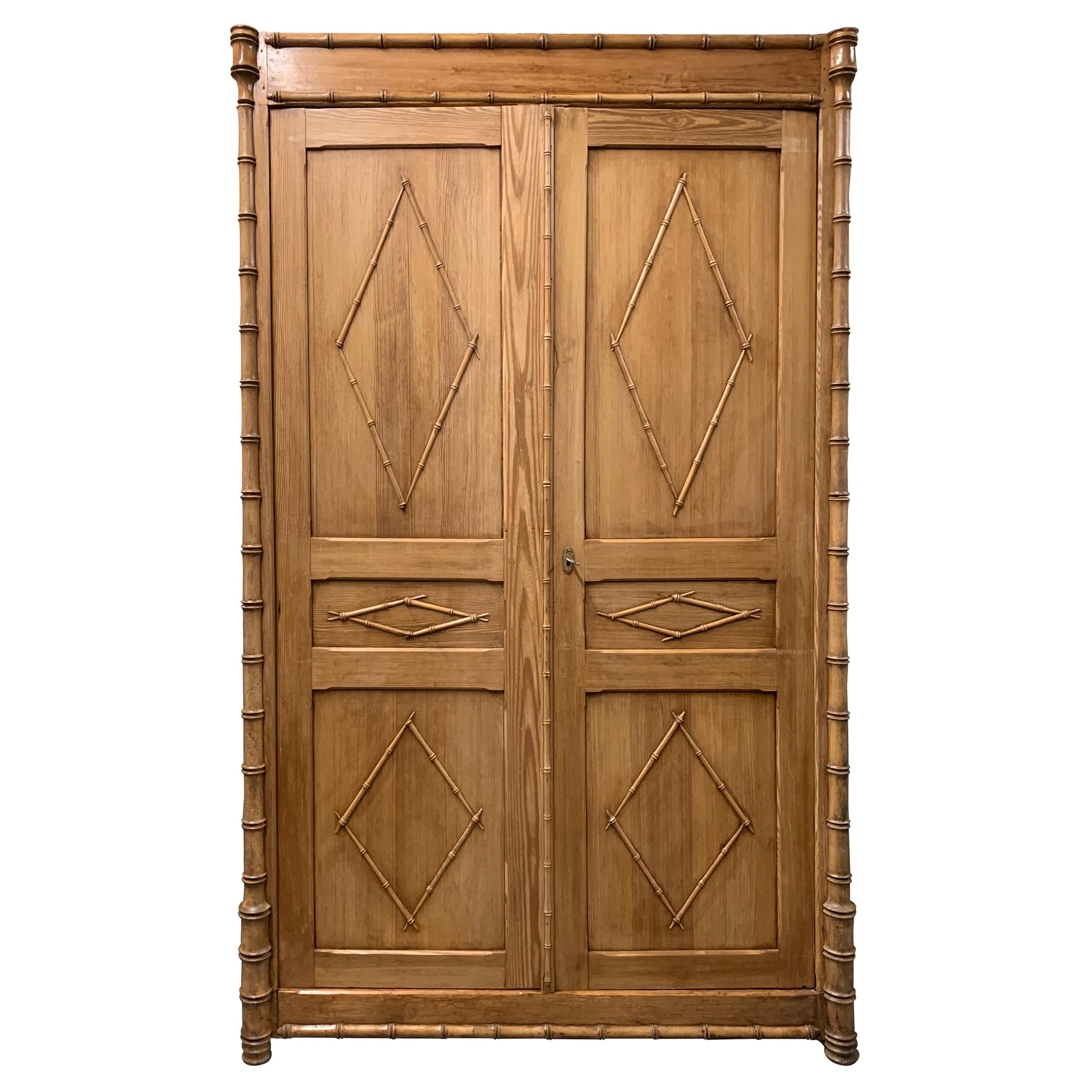 Antique French Pine Two-Door Armoire with Faux Bamboo Carved Motif