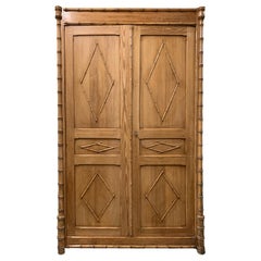 Antique French Pine Two-Door Armoire with Faux Bamboo Carved Motif