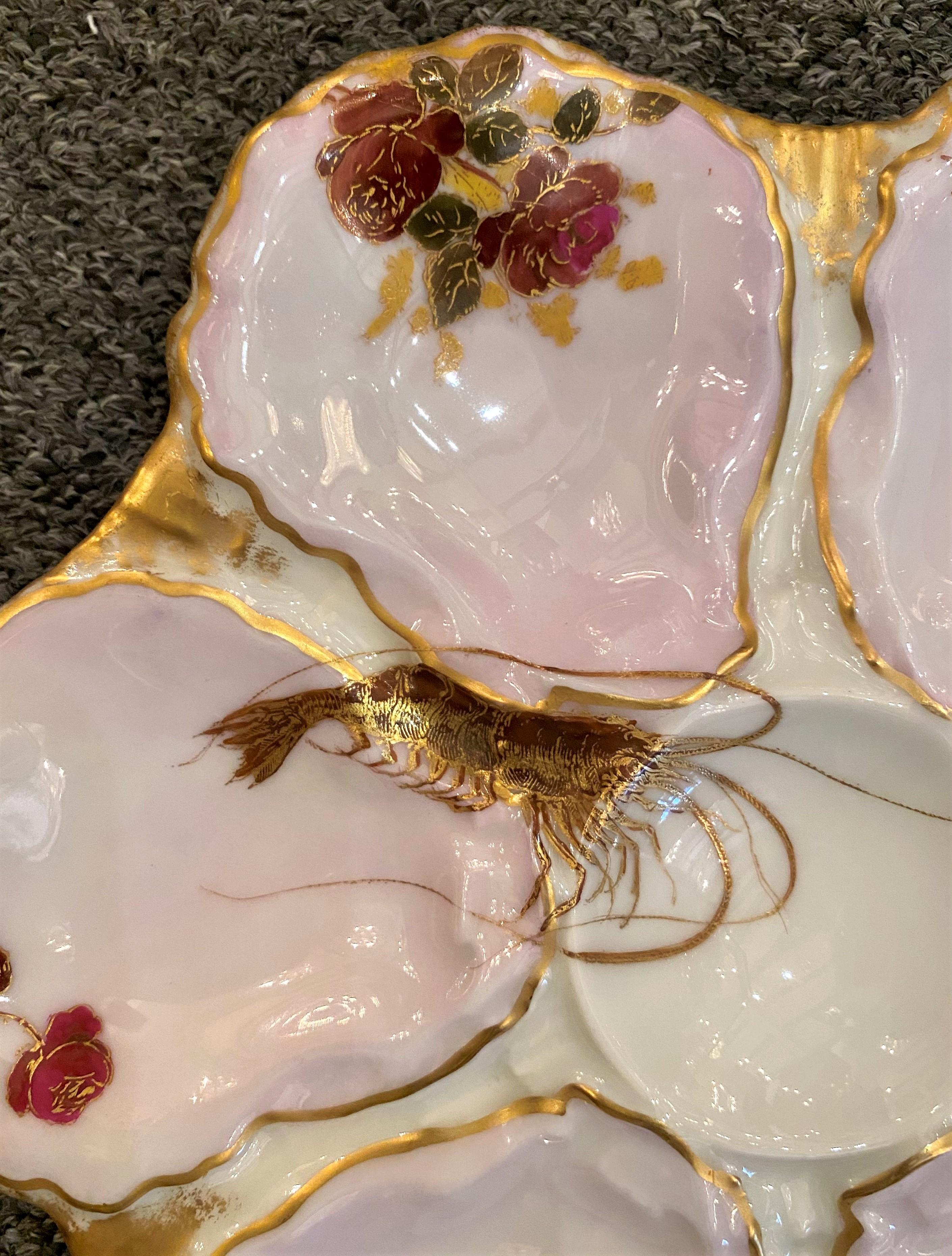 Antique French hand painted pink, red, yellow and gold Limoges porcelain oyster plate signed, 