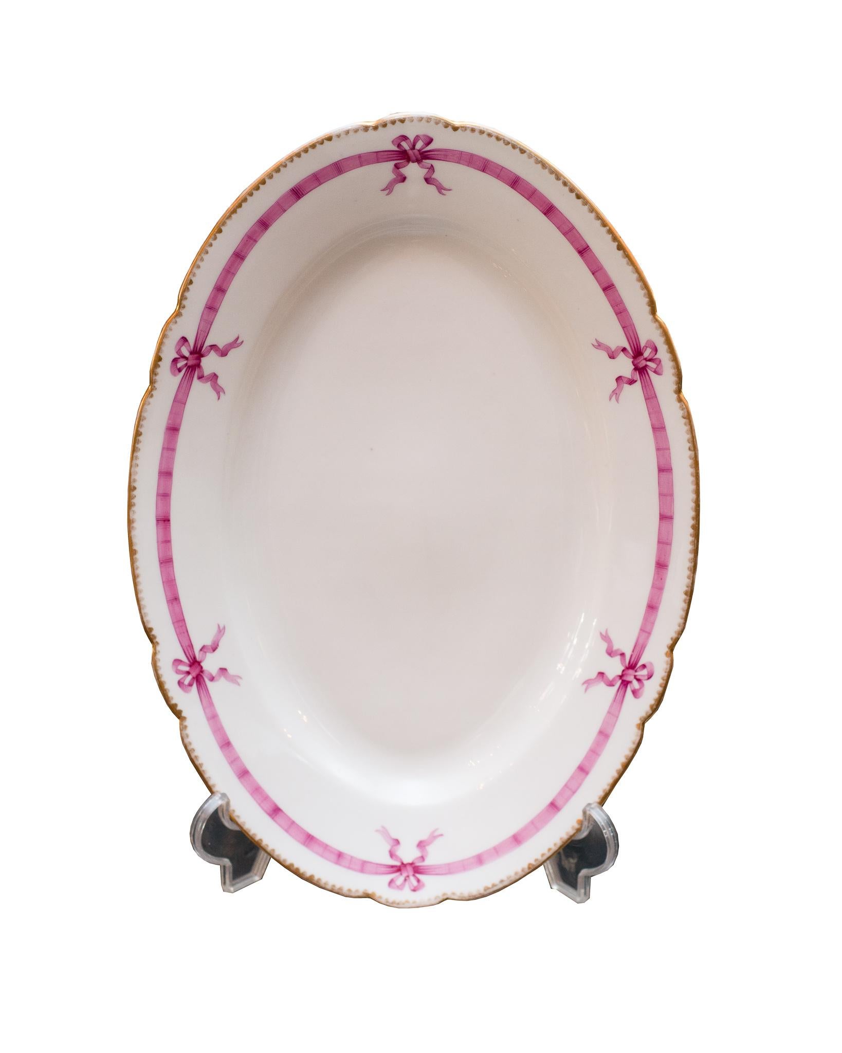 Antique French 22-Piece White Porcelain Dinner Set with Pink Ribbon Motif In Fair Condition In Toronto, ON