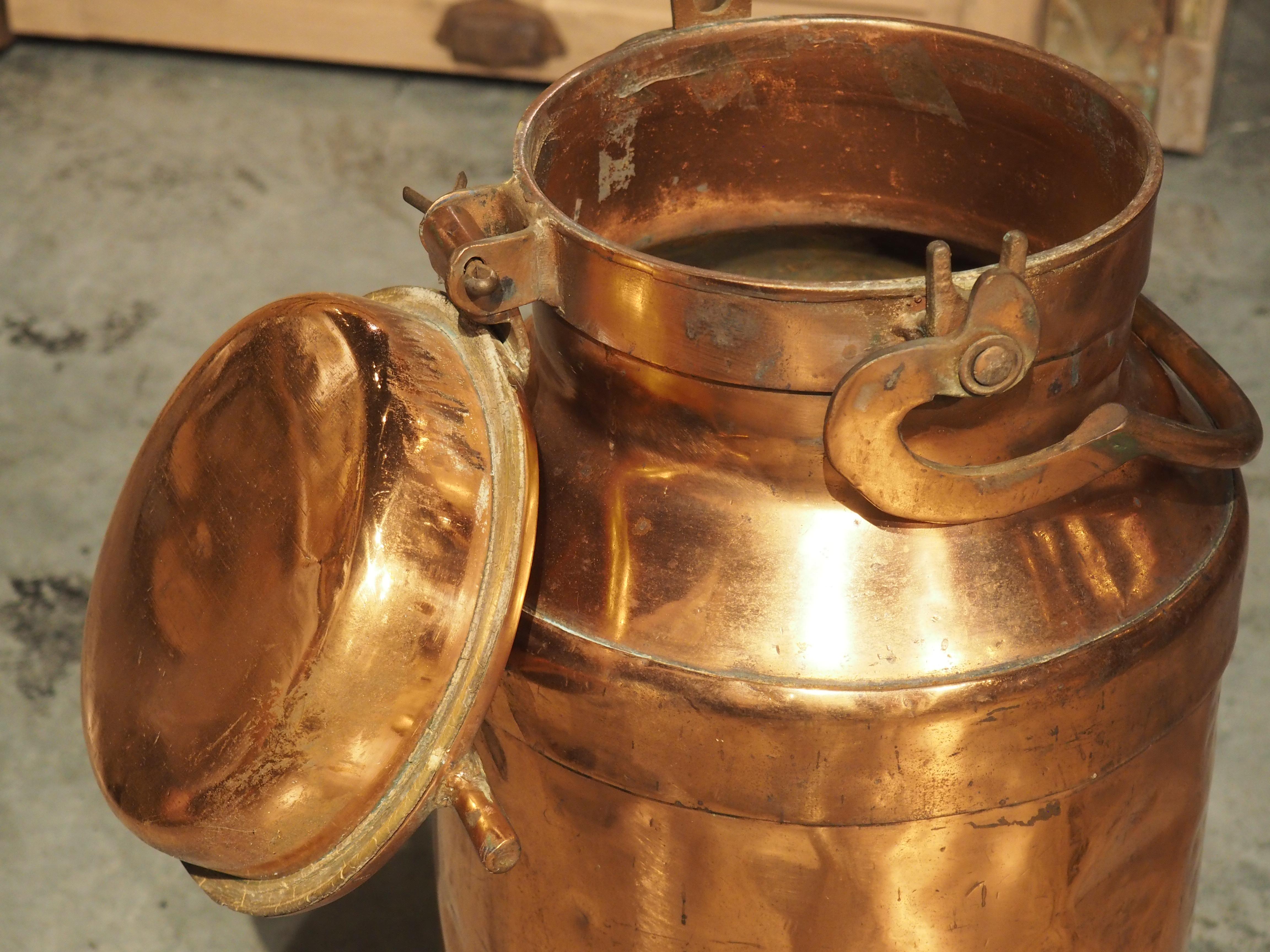 Before the advent of refrigerated trucks, metal milk containers, such as this French polished copper from circa 1890, would be used by dairy farmers to transport milk to customers. The farmers would load several of these containers with fresh milk,