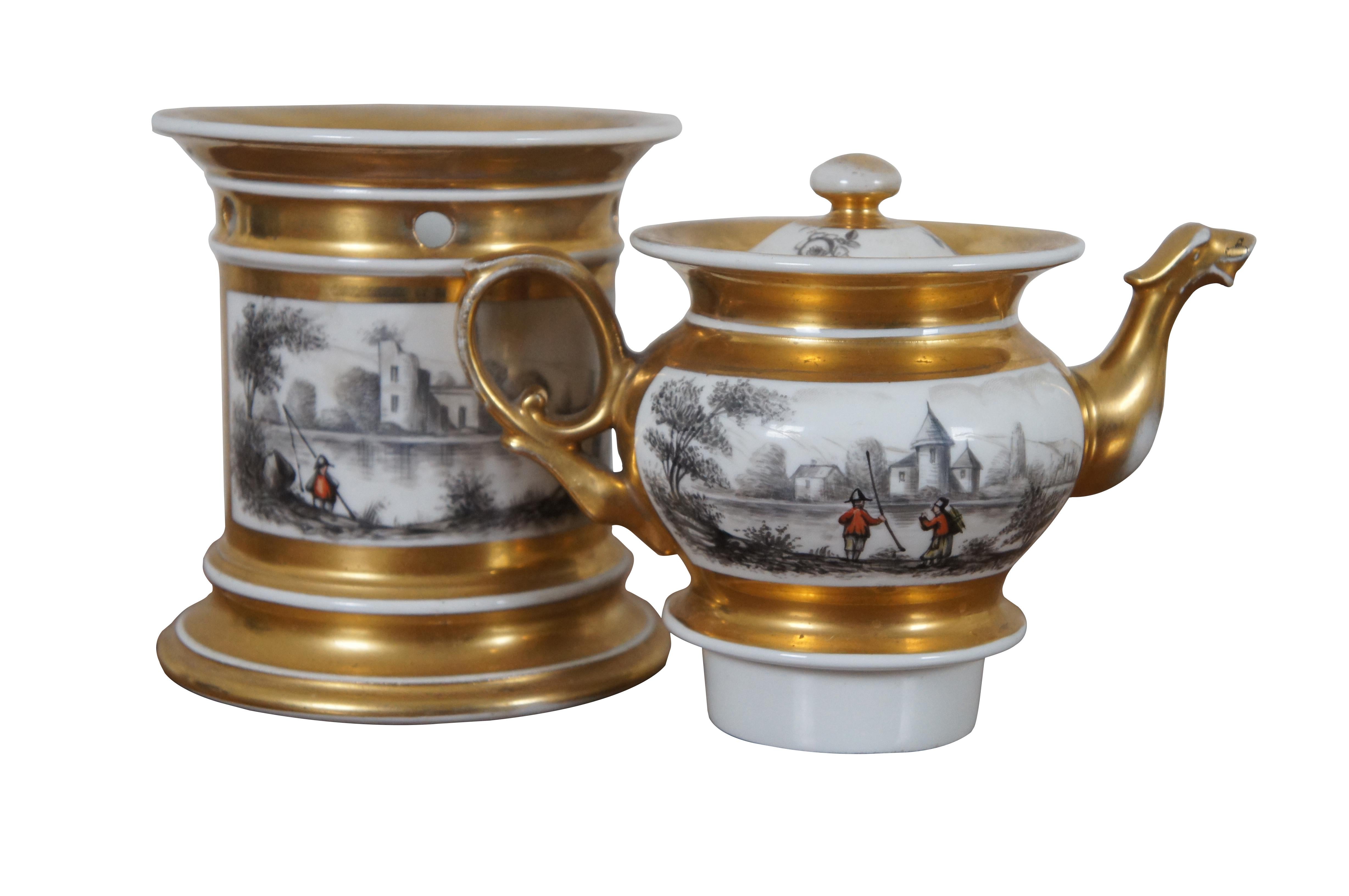 Antique 19th century porcelain veilleuse tisaniere - French teapot warmer made of white porcelain gilded throughout around black and white hand painted farmhouse landscape / lake / river / fishing scene with red and yellow painted figures.  Marked