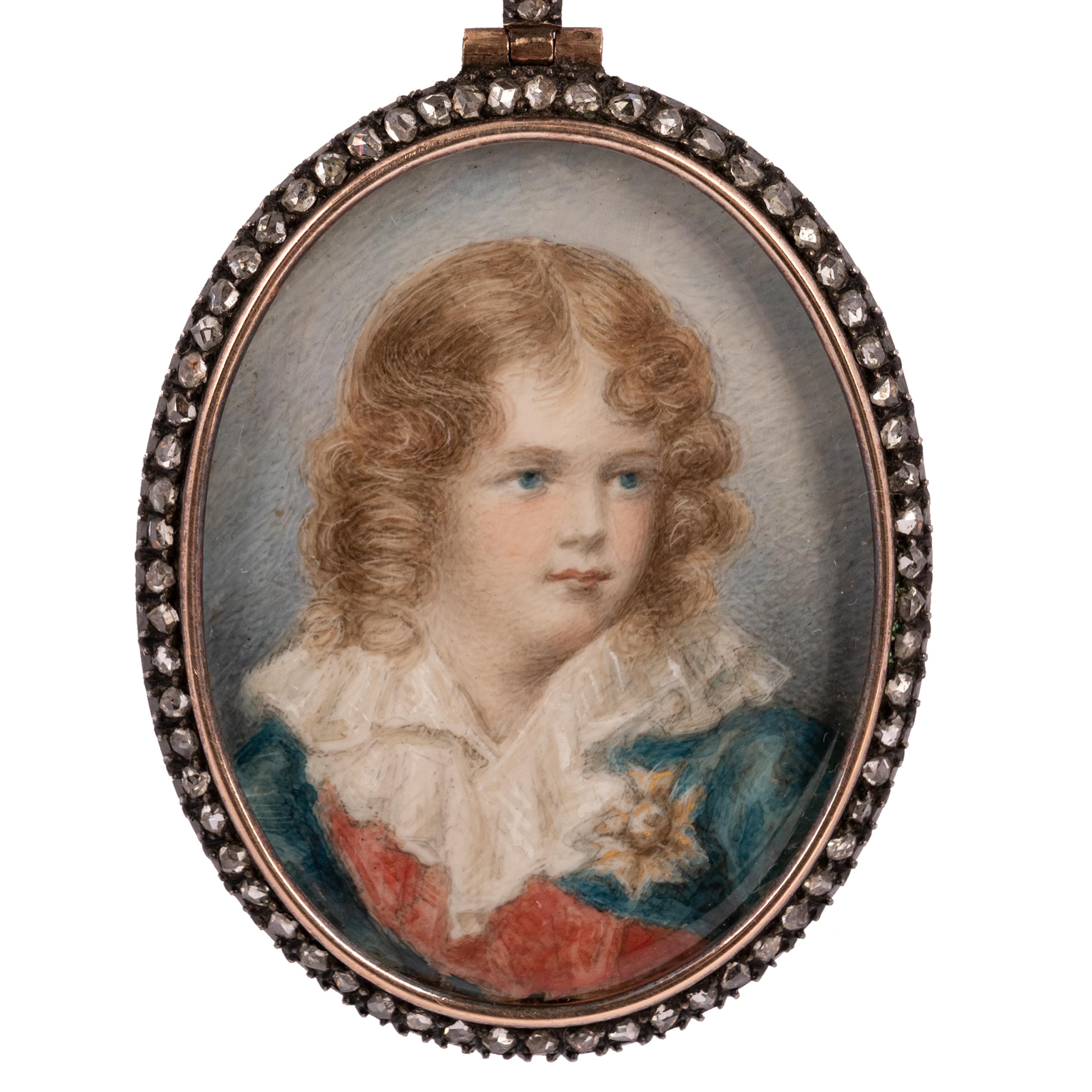 A fine antique French portrait miniature painting of Napoleon II, set in an 18 karat gold and silver frame inset with diamonds, 1879.
The frame having a hinged back that is made of 18k gold (guaranteed and tested) the bezel or frame is silver and is