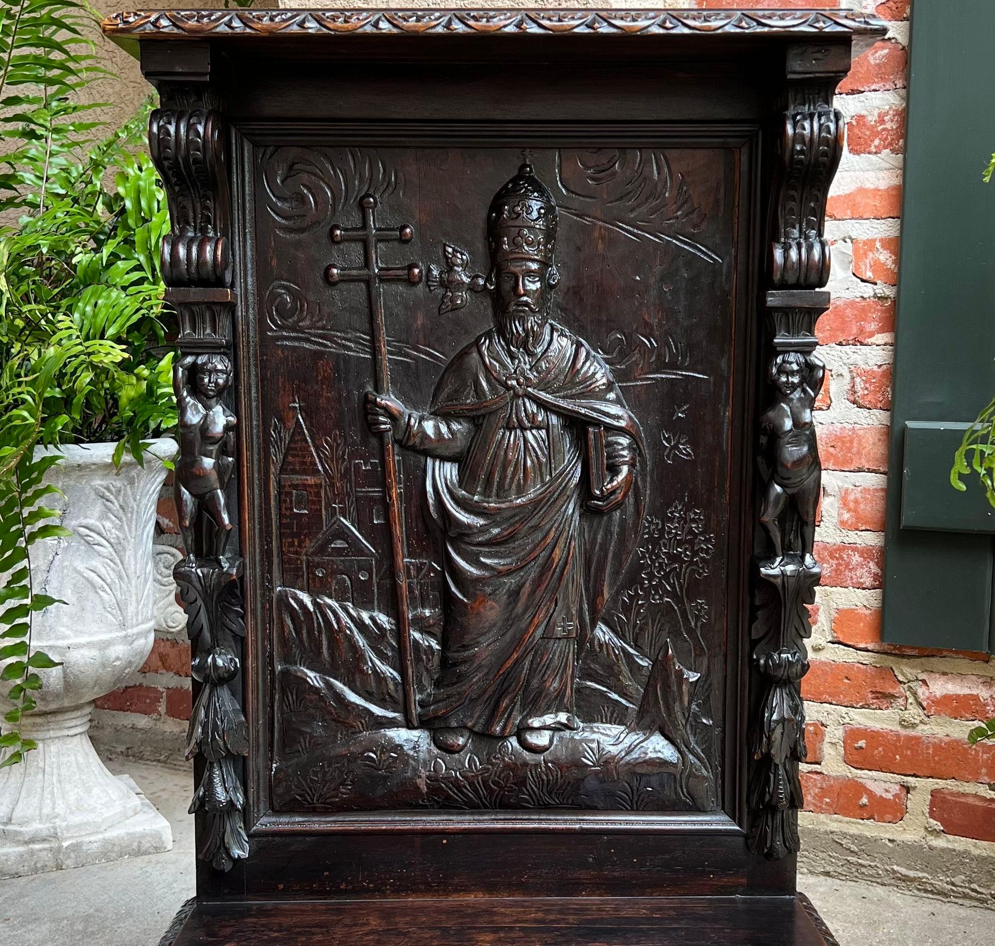 Antique French Prayer Kneeler St. Gregory Cross Catholic Chapel Carved Oak c1880.

Direct from France, one of two highly carved antique prayer kneelers (or “prie dieu”) from our most recent container.
The stunning panel back here features a hand