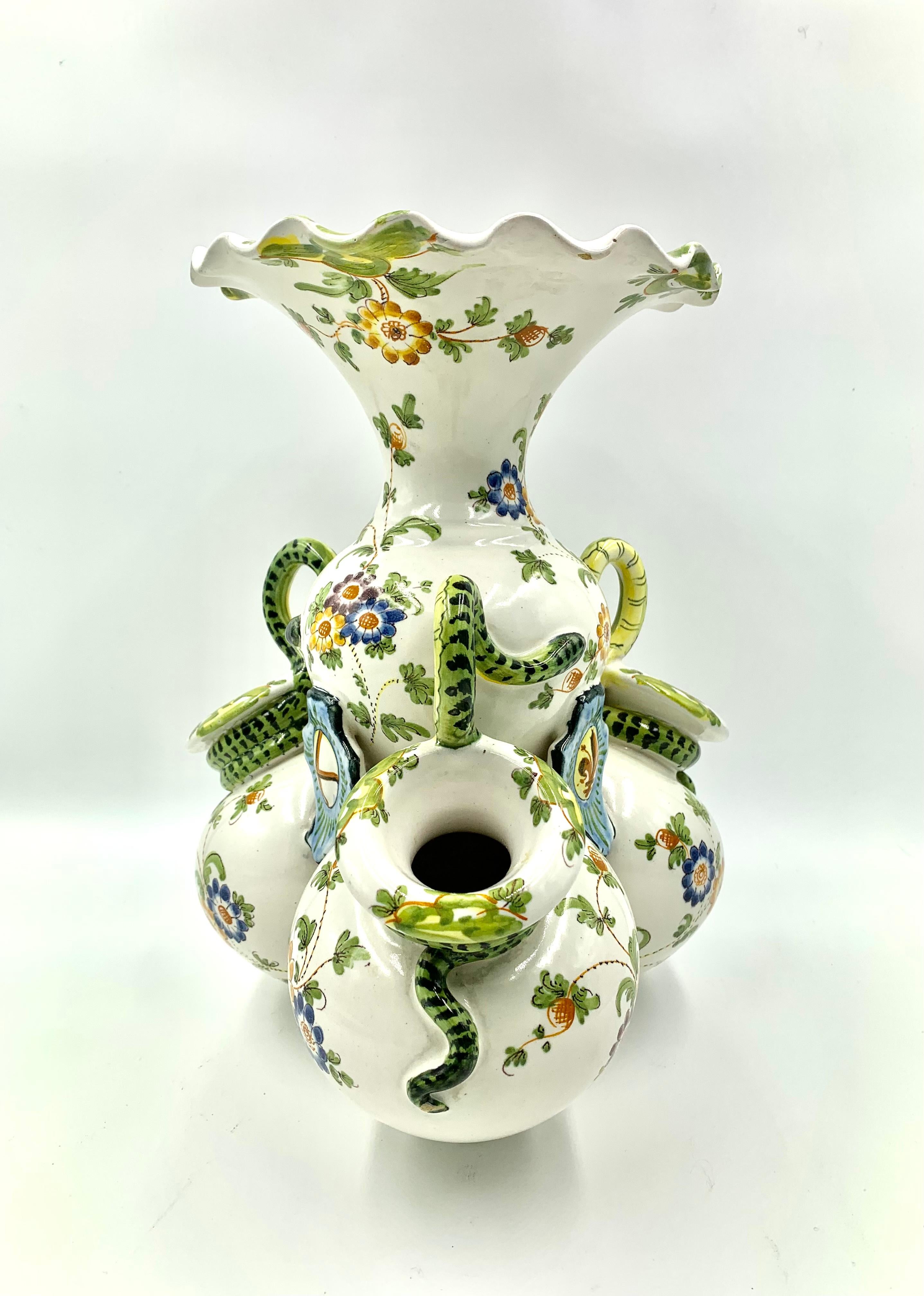 Fabulous antique French Provincial faience Armorial snake handled bough pot vase with three Armorial shields depicting a Fleur-de-Lis, a Cross and a V shaped emblem topped by a large blue circular device. Composed of three lower lever amphora shaped
