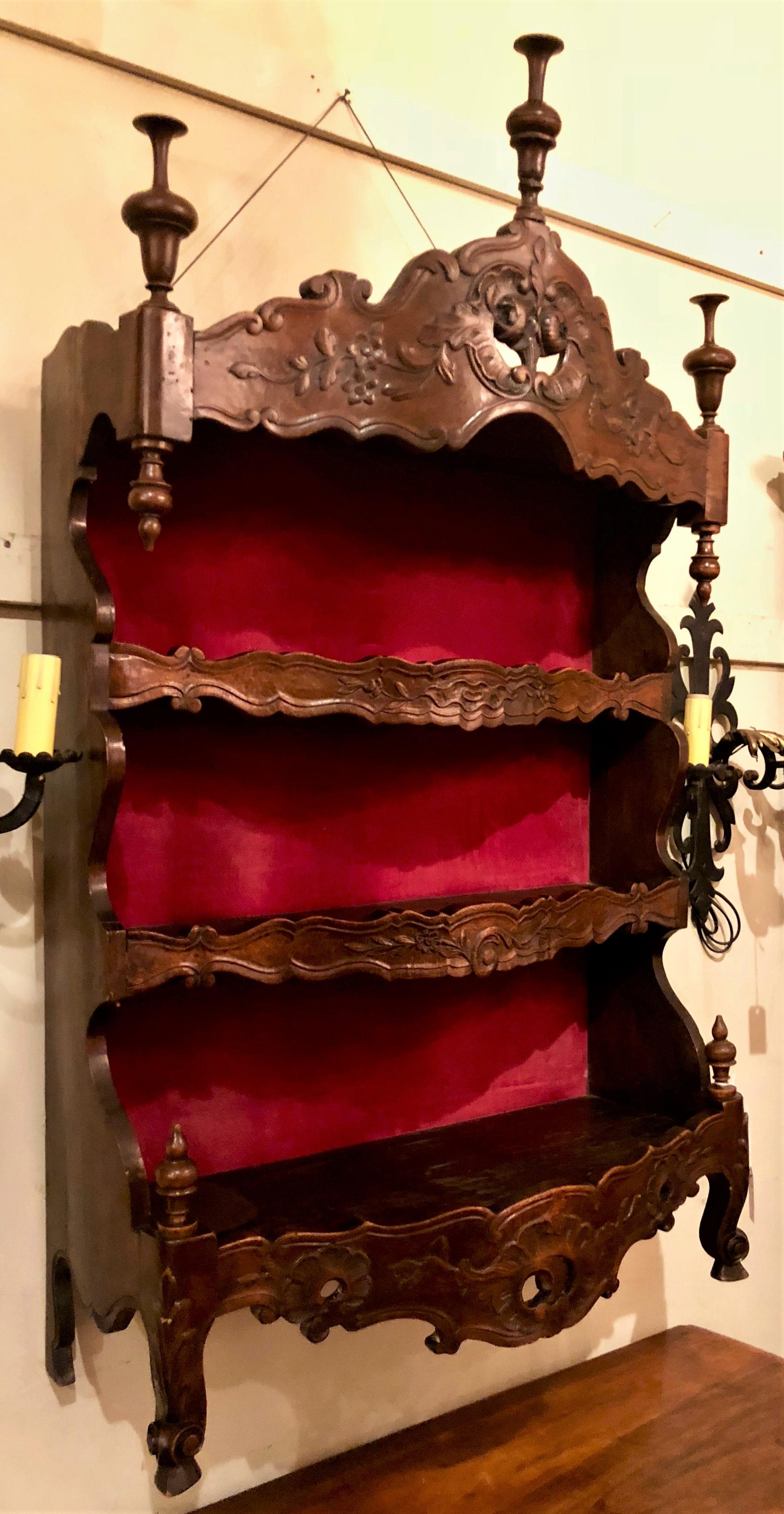 A handsome pair of carved oak shelves to hang on the wall.