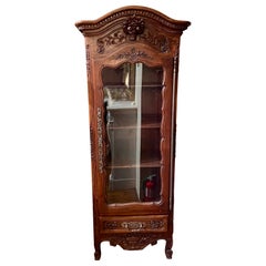 Antique French Provincial Carved Walnut Glass Front Bonnetiere, Circa 1880.