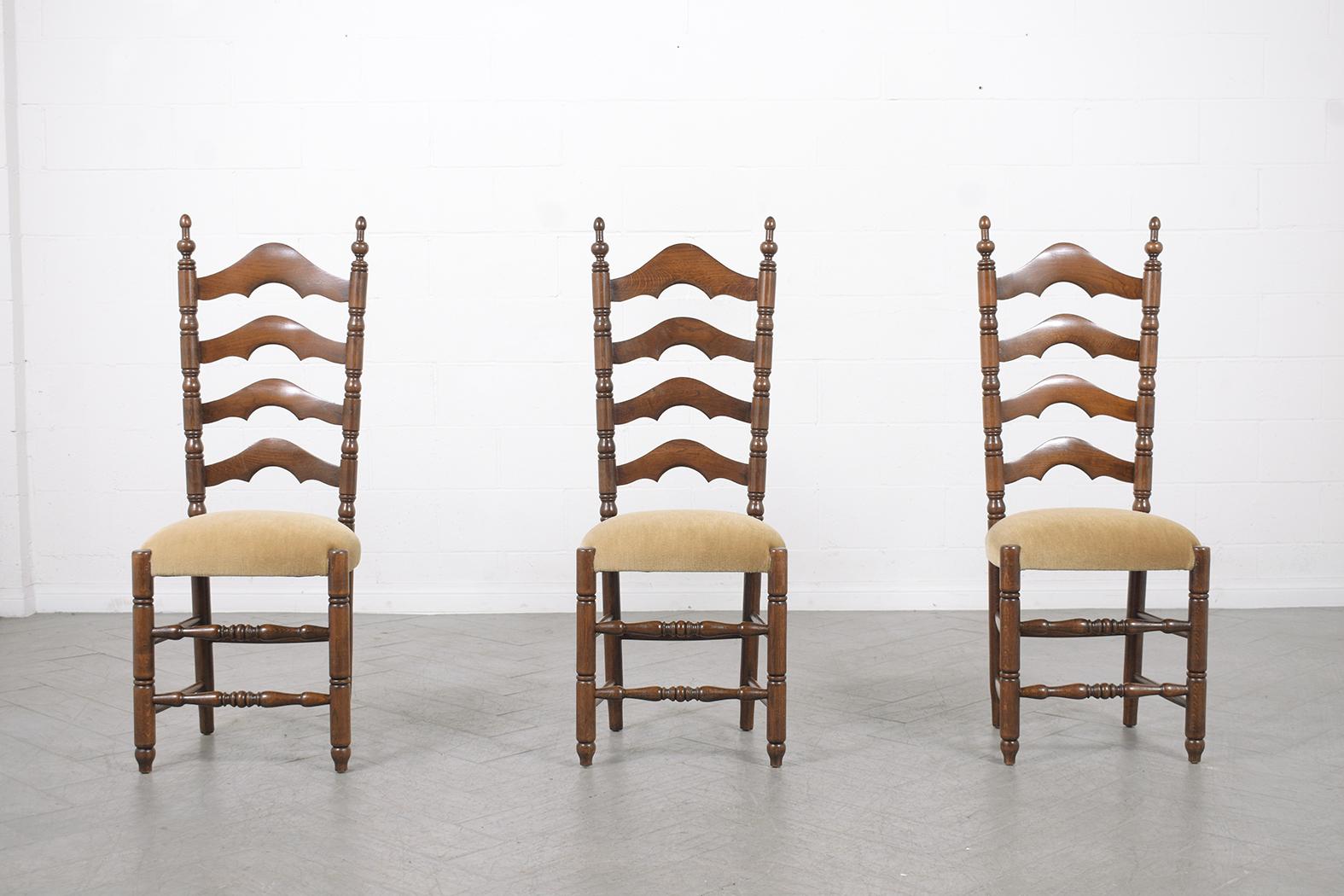 Introducing our exceptional set of six French Provincial Dining Chairs, dating back to the 1900s. These chairs have been meticulously restored and reupholstered by our in-house team of expert craftsmen, ensuring they retain their timeless elegance