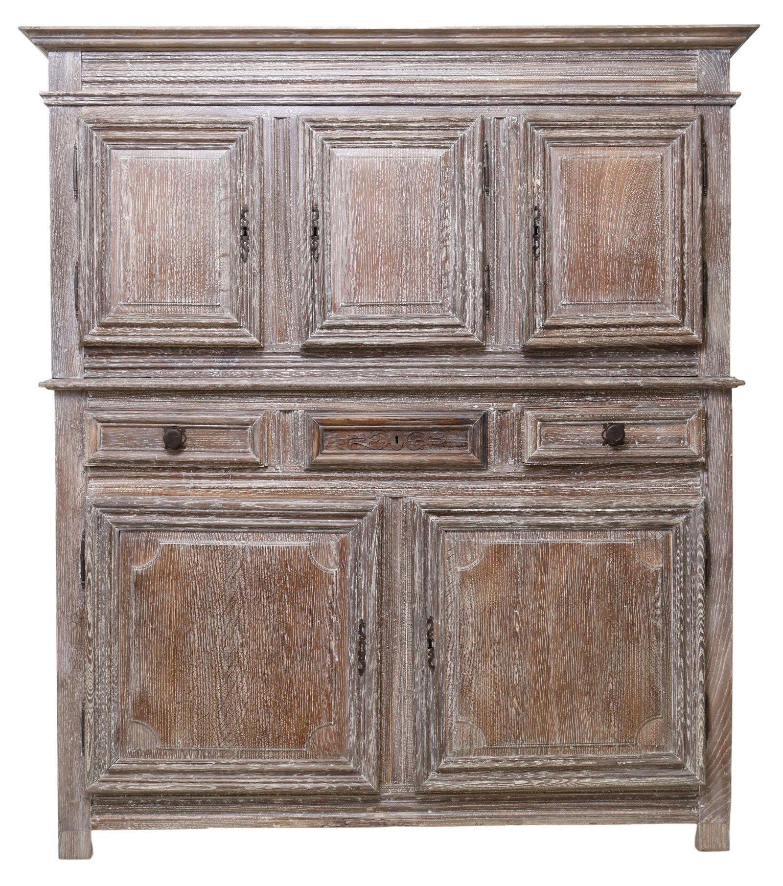 Large antique French Provincial sideboard, 19th c. Painted with a light gray-wash later. Also having stepped cornice, over three cabinet doors, three drawers, above two additional cabinet doors, shelved interior, raised on bracket feet. Attractive