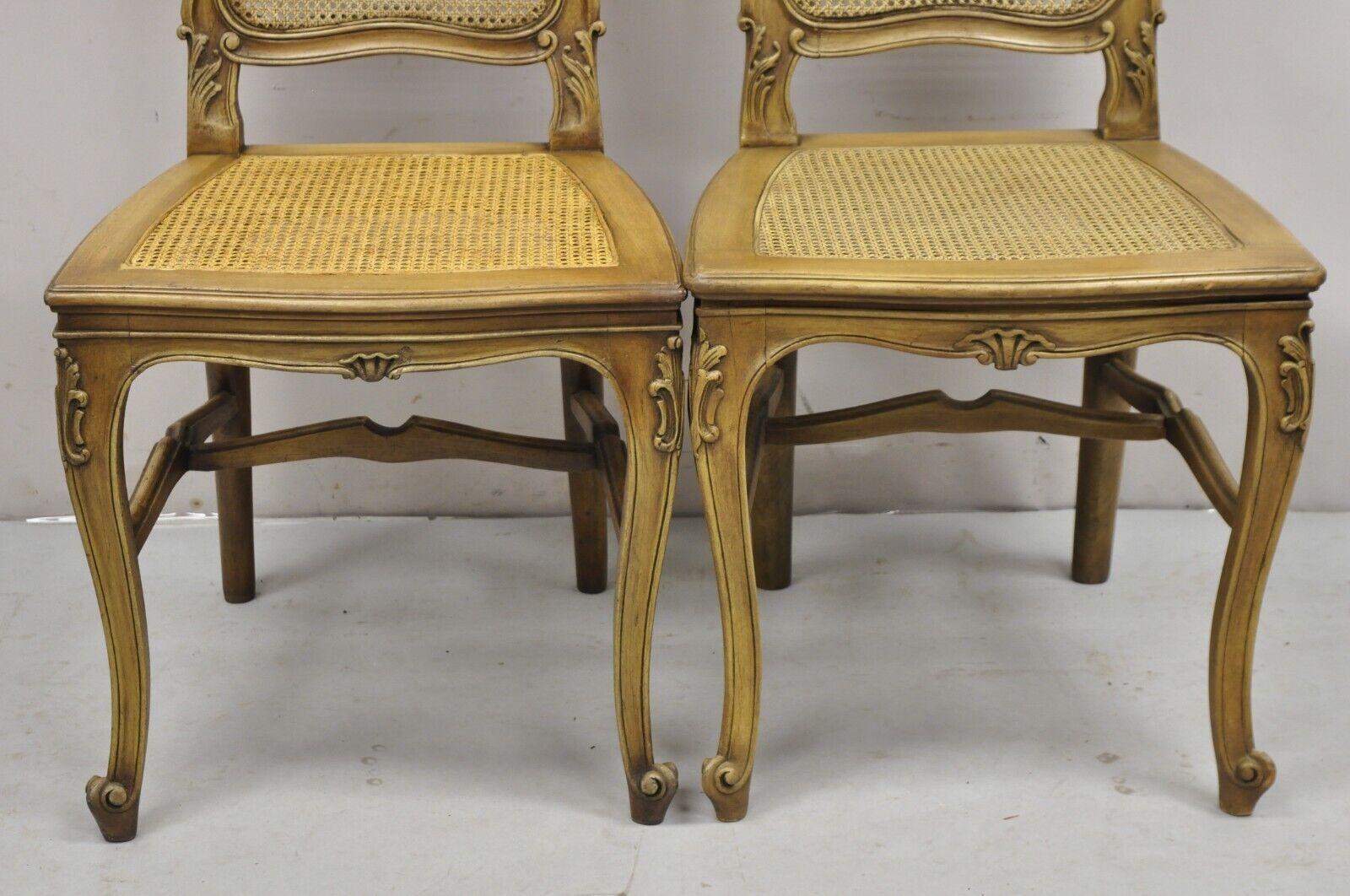 20th Century Antique French Provincial Louis XV Style Carved Walnut Cane Dining Chair - Pair For Sale