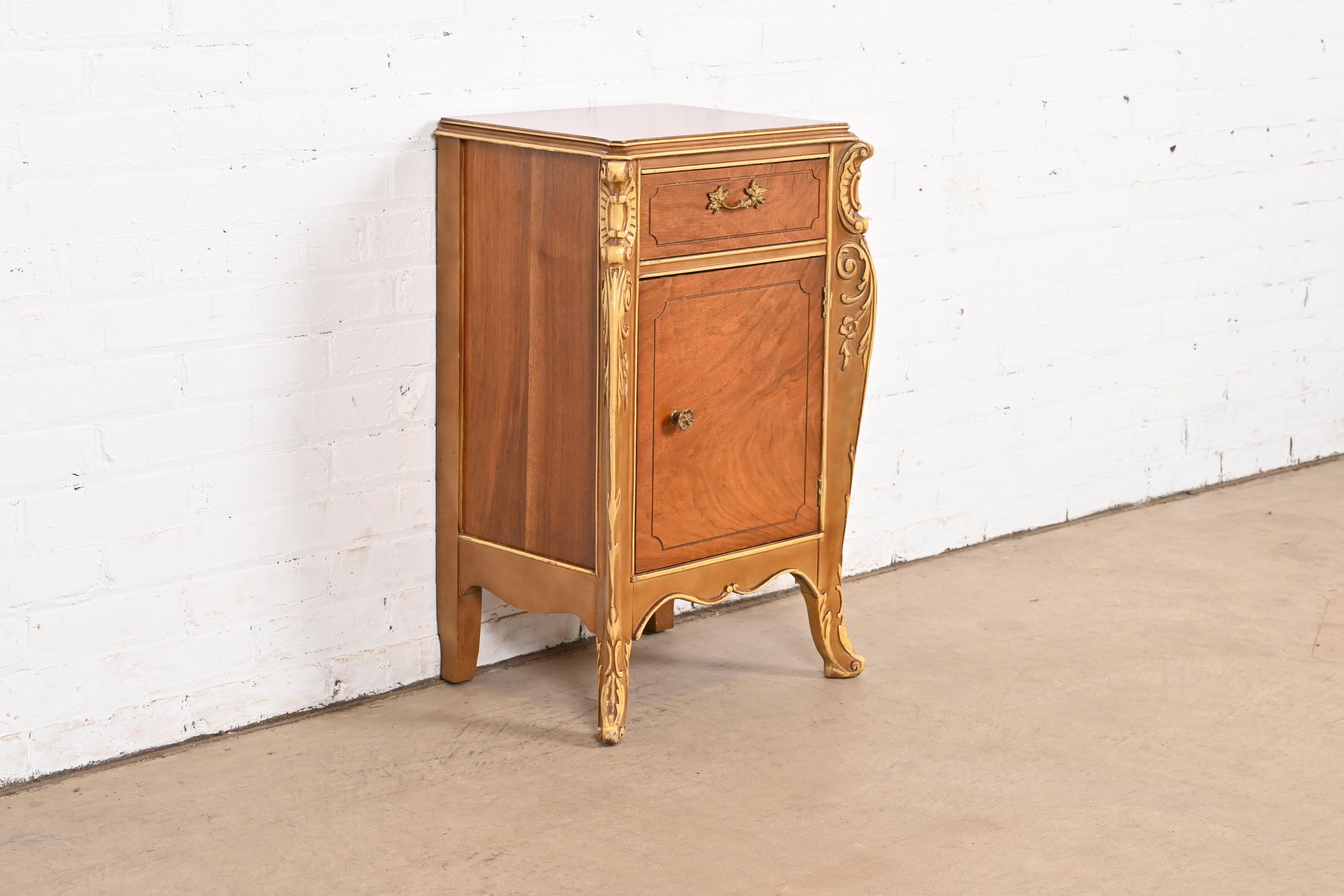 American Antique French Provincial Louis XV Walnut and Parcel Painted Nightstand, 1920s For Sale