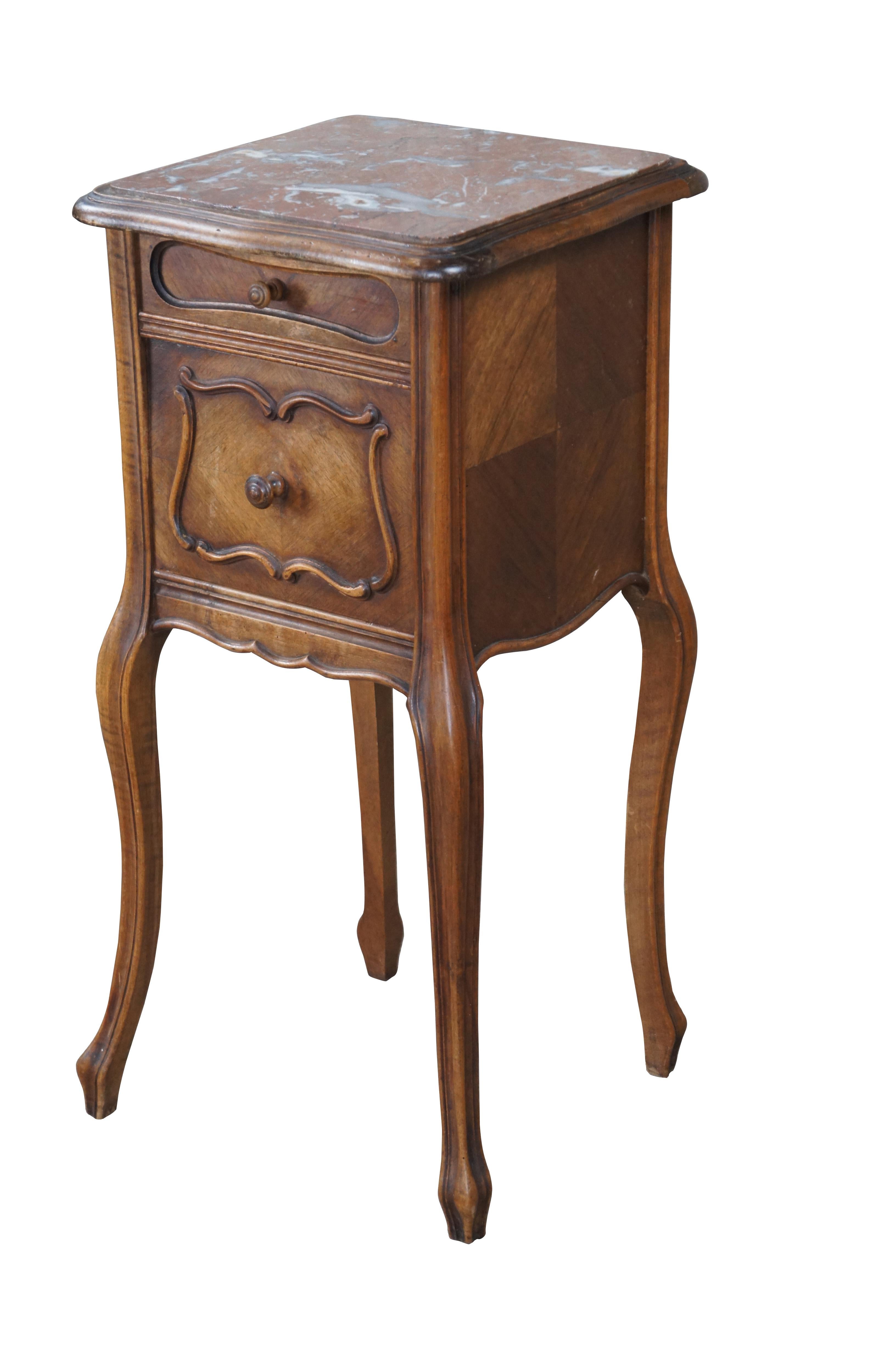 Antique French Provincial / Louis XV bedside cabinet / nightstand / side table / smoke stand / tobacco humidor.  Made of walnut featuring royal rouge marble top with one drawer and marble lined cabinet supported by long serpentine