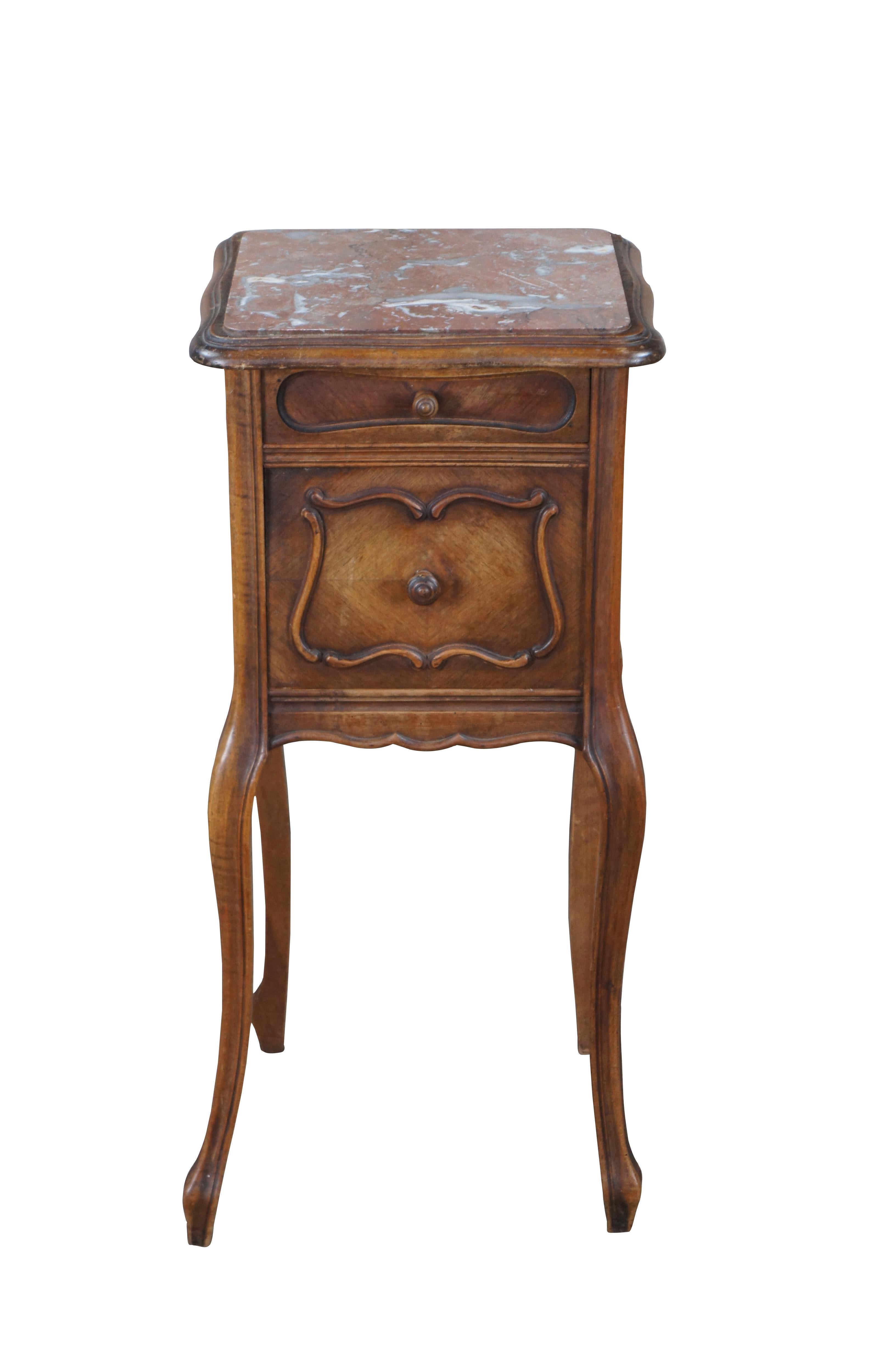 Antique French Provincial / Louis XV bedside cabinet / nightstand / side table / smoke stand / tobacco humidor.  Made of walnut featuring royal rouge marble top with one drawer and marble lined cabinet supported by long serpentine