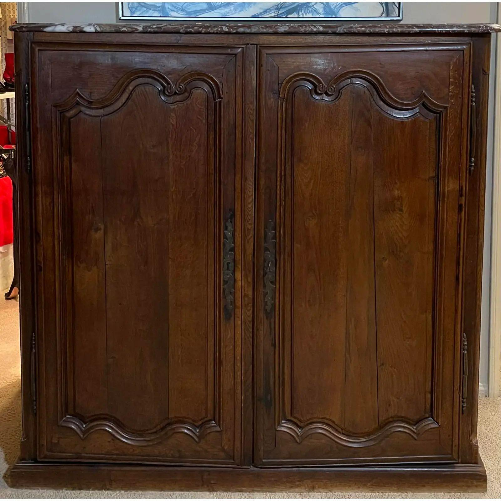 Antique 18th century French Provincial marble top wardrobe cupboard. It is a very unusual example in carved walnut with a marble to and customized interior with 12 drawers.

Additional information: 
Materials: Marble
Color: Brown
Period: 18th
