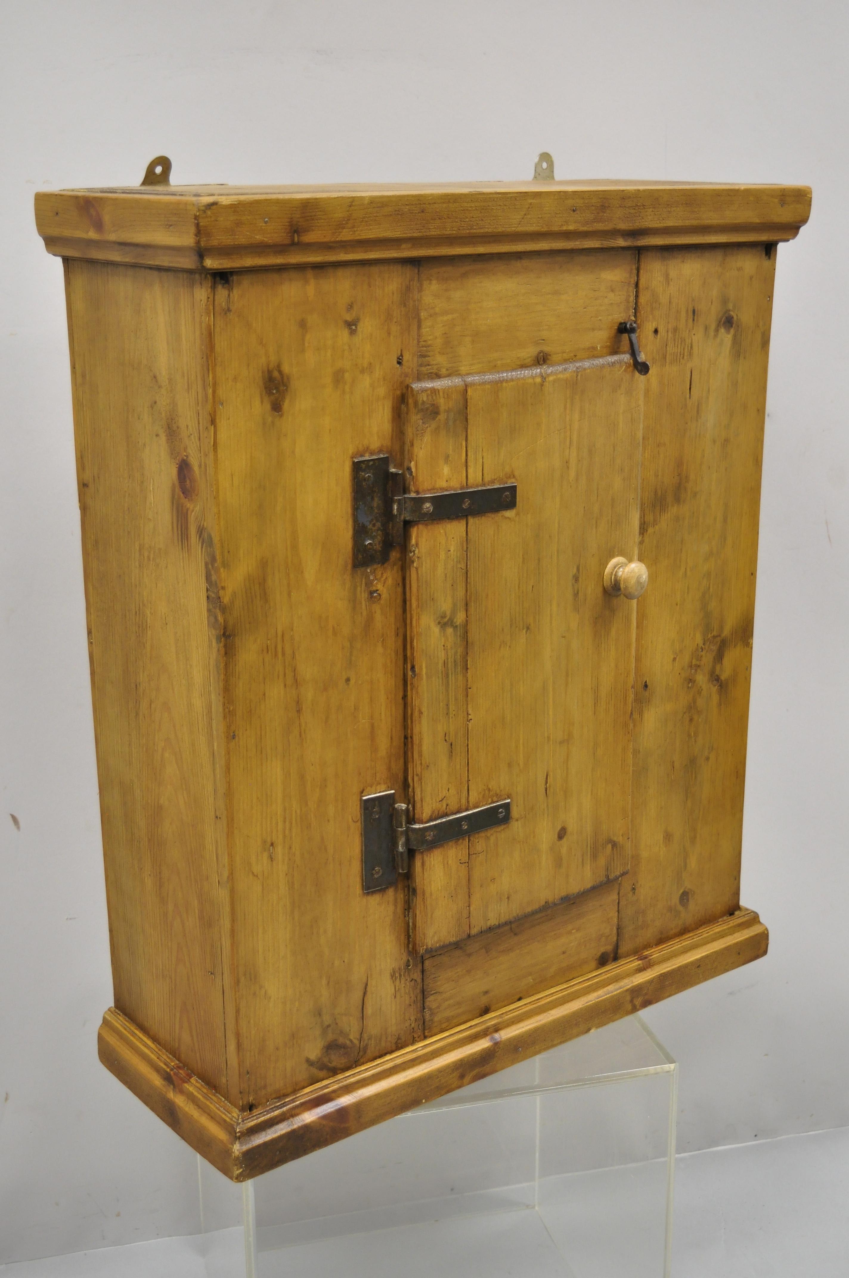 Antique French Provincial style one door reclaimed wood wall cabinet cupboard pantry. Item is constructed with antique reclaimed wood, cast iron hinges, distressed finish, 1 swing door, 1 wooden shelf, very nice item, quality craftsmanship, great