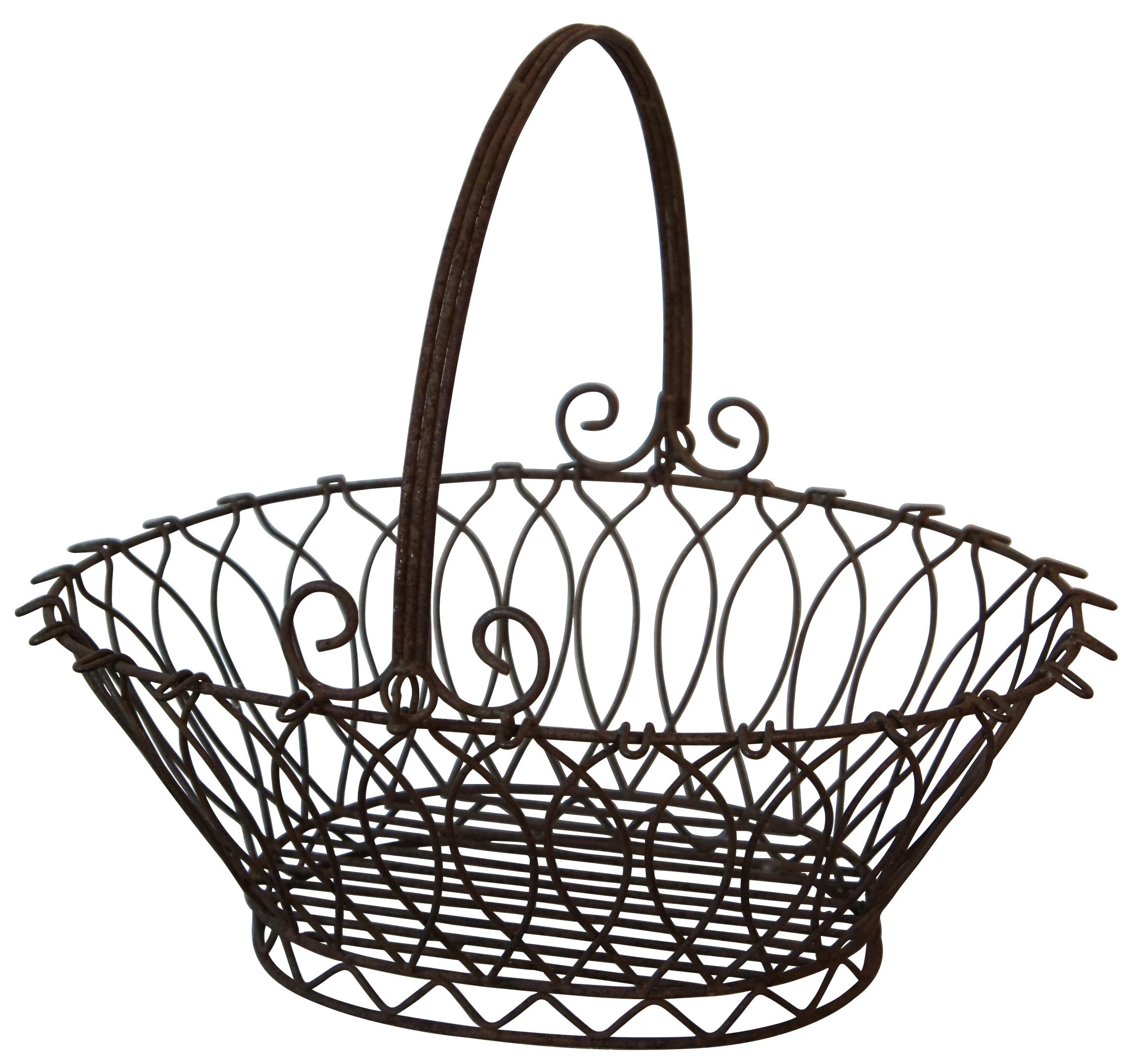 Antique ornate French Provincial wire basket with rotating handle.

Measures: 16.5” x 13.5” x 7.5” / Height of Handle – 8” (Width x Depth x Height).
 