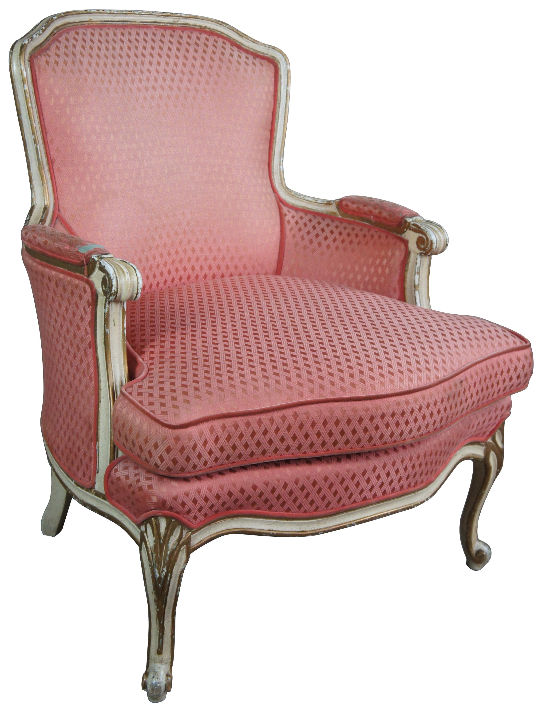French Provincial armchair, circa 1930s. Off-white with gold trim and red/pink upholstery with interwoven design.