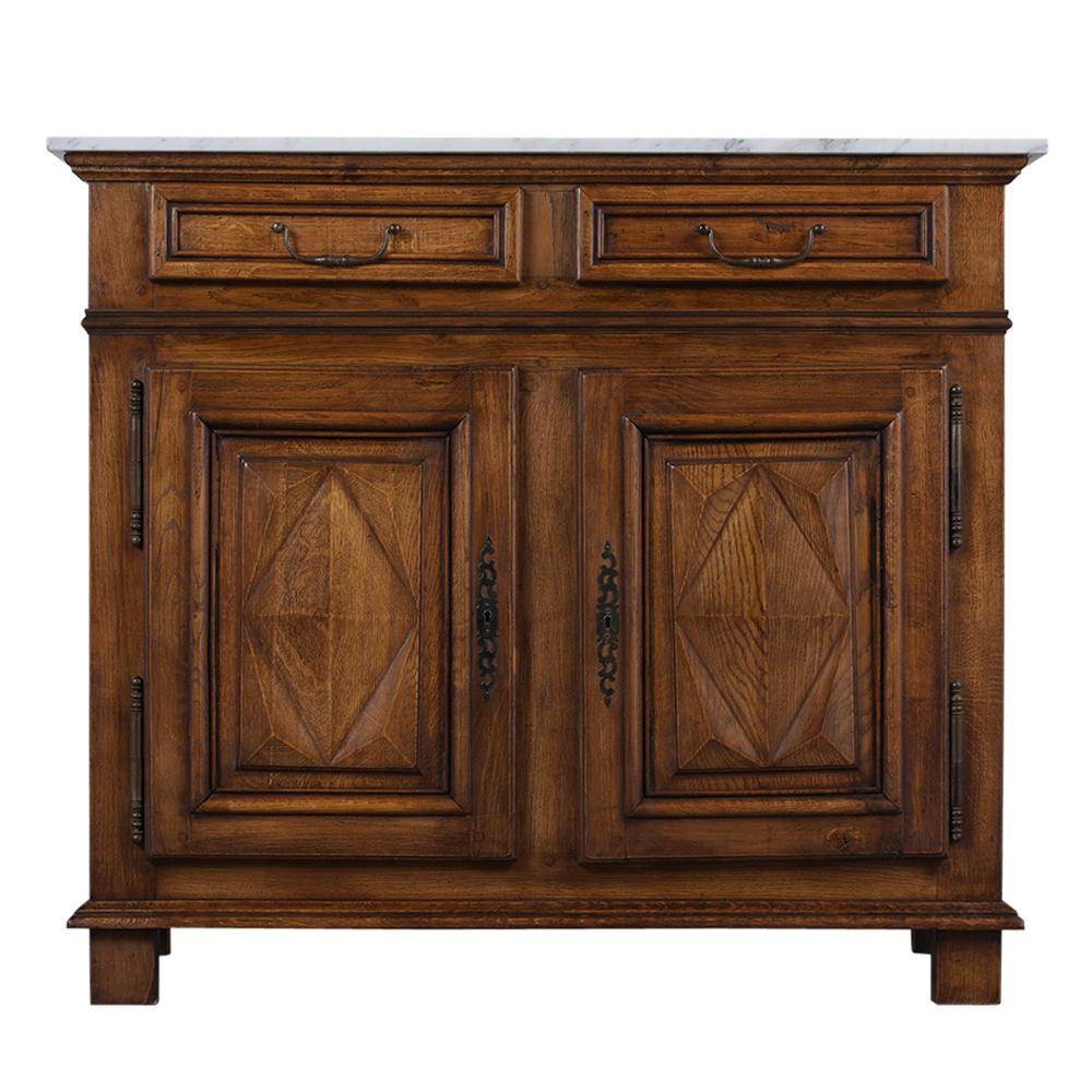 This 1890s French Provincial style buffet is made of oakwood and is stained in a walnut color. The server has a white marble top features 2 top drawers with bronze pull handles, this server has two doors with molding detailing and geometric diamond