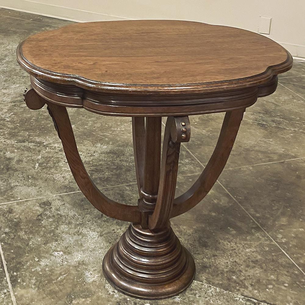 Antique French Quatrefoil pedestal table ~ End Table was meticulously hand-crafted from hand-select oak chosen for its tight, close grain and lack of knots or imperfections, resulting in a table that appears more like walnut than oak. The quatrefoil