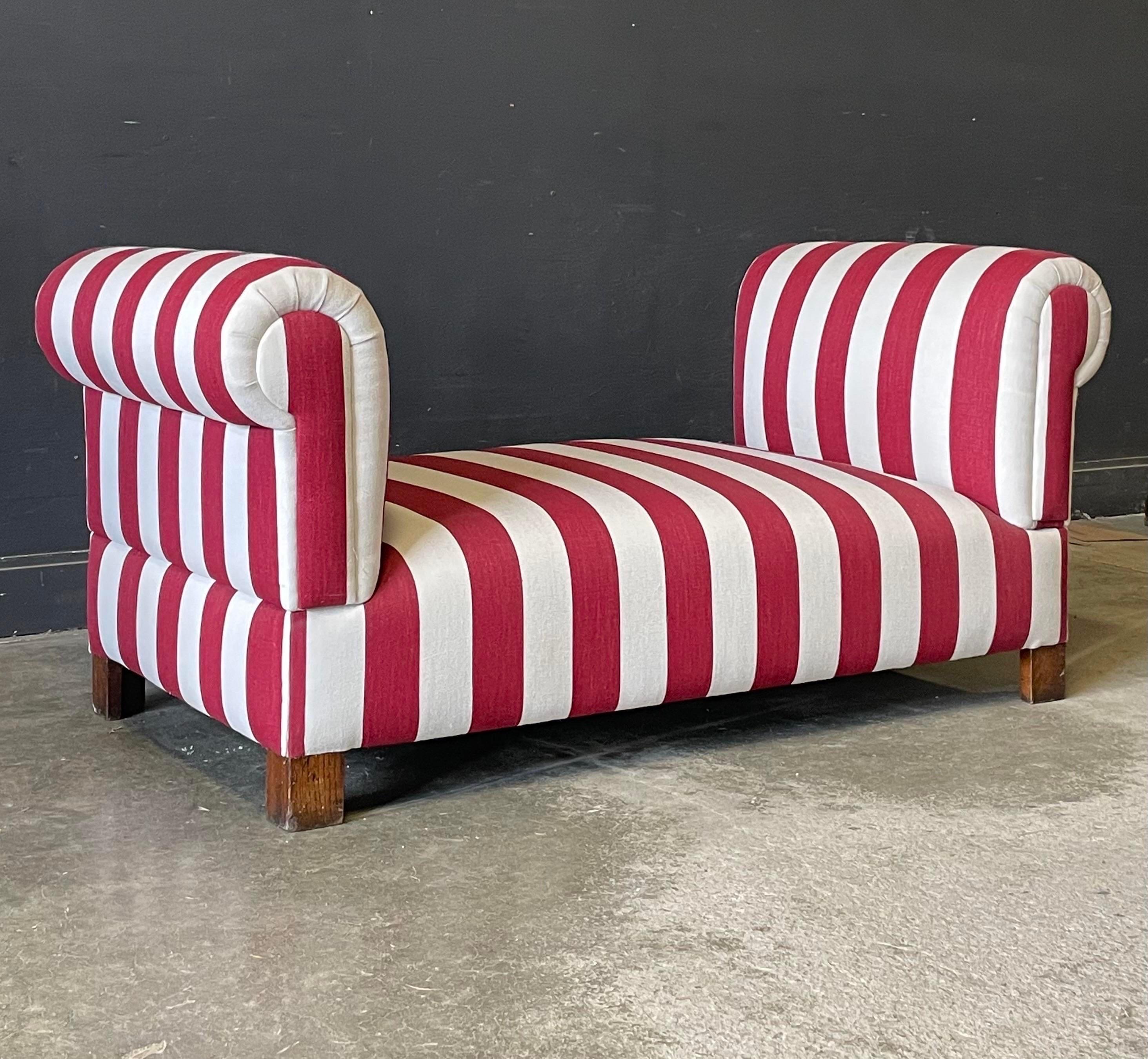 This antique French daybed is freshly upholstered in 100% Belgian linen with a thick Ruby stripe, rotary screen printed in London exclusively for Buchanan Studio. Classic and timeless design!