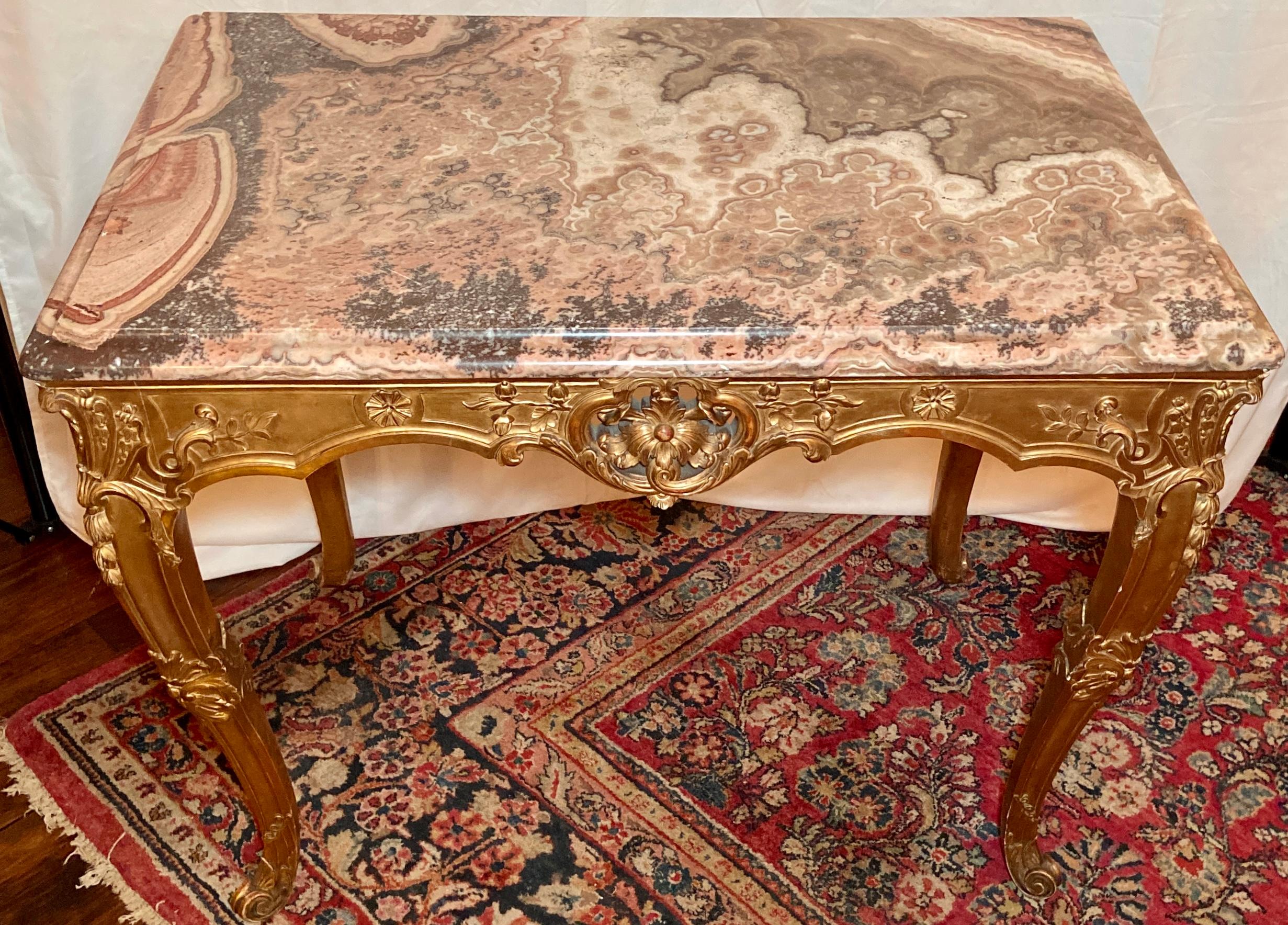 Antique French Régence carved wood center table with gold-leaf and rare marble top, Circa 1840-1850.
