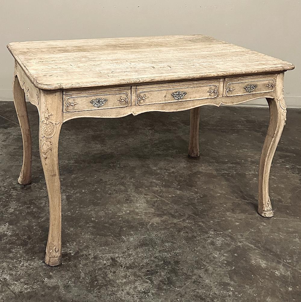 Antique French Regence Stripped Oak Desk ~ Writing Table is a delightful little desk that is ideal for efficient floor plans, home offices, or just as a convenient table for any room!  Hand-crafted from solid oak, it features a beveled solid plank