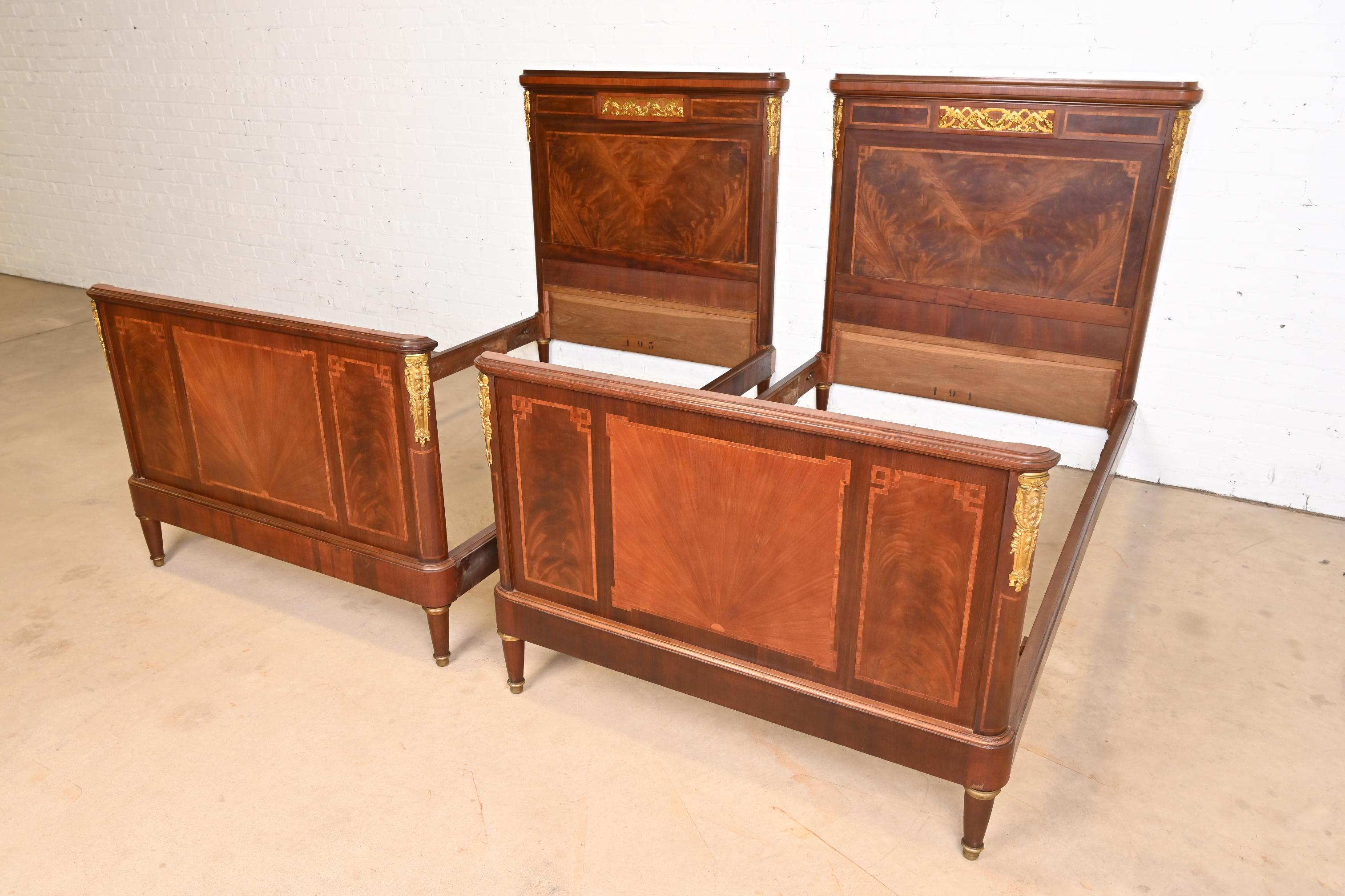 20th Century Antique French Regency Louis XVI Inlaid Flame Mahogany Bronze Mounted Twin Beds For Sale