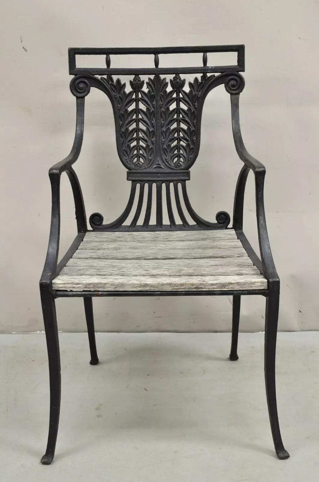 Antique French Regency Style Cast Iron Wooden Slat Garden Arm Chair. Circa Early 20th Century. Measurements: 35.5