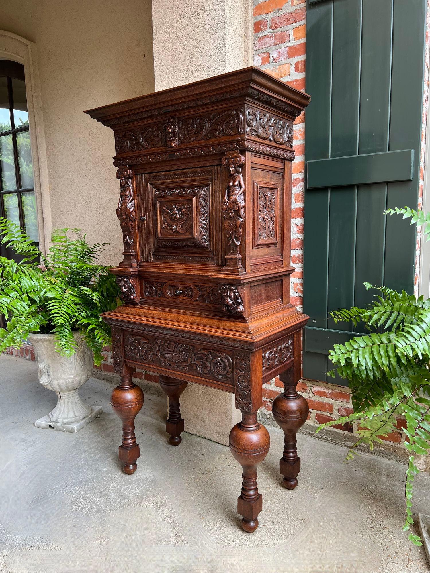 Antique French Renaissance Cabinet Server Carved Oak Bookcase Sideboard c1880.

Direct from France, a stunning antique French cabinet with opulent hand carvings that create quite a statement piece for any room in your home!

The Renaissance style