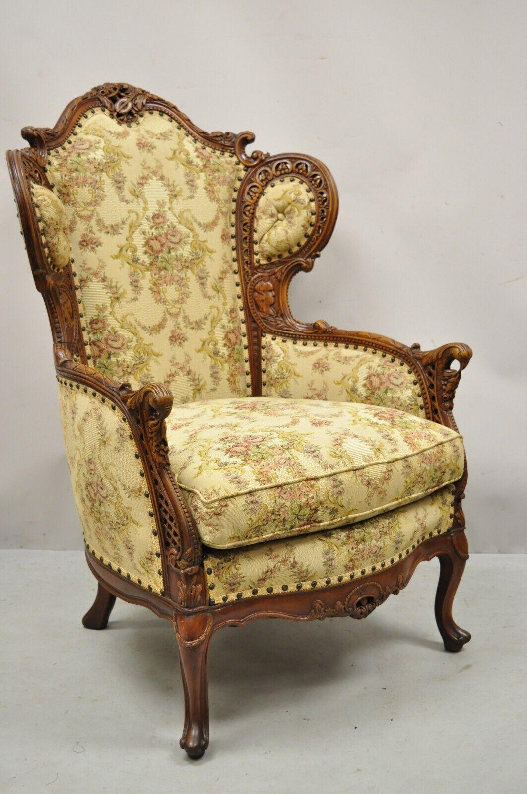 Antique French Renaissance Carved Walnut Figural Fireside Lounge wingback chair. Item features face carvings to wingback, bird and lattice carving to armrests, solid wood frame, beautiful wood grain, nicely carved details, cabriole legs, very nice