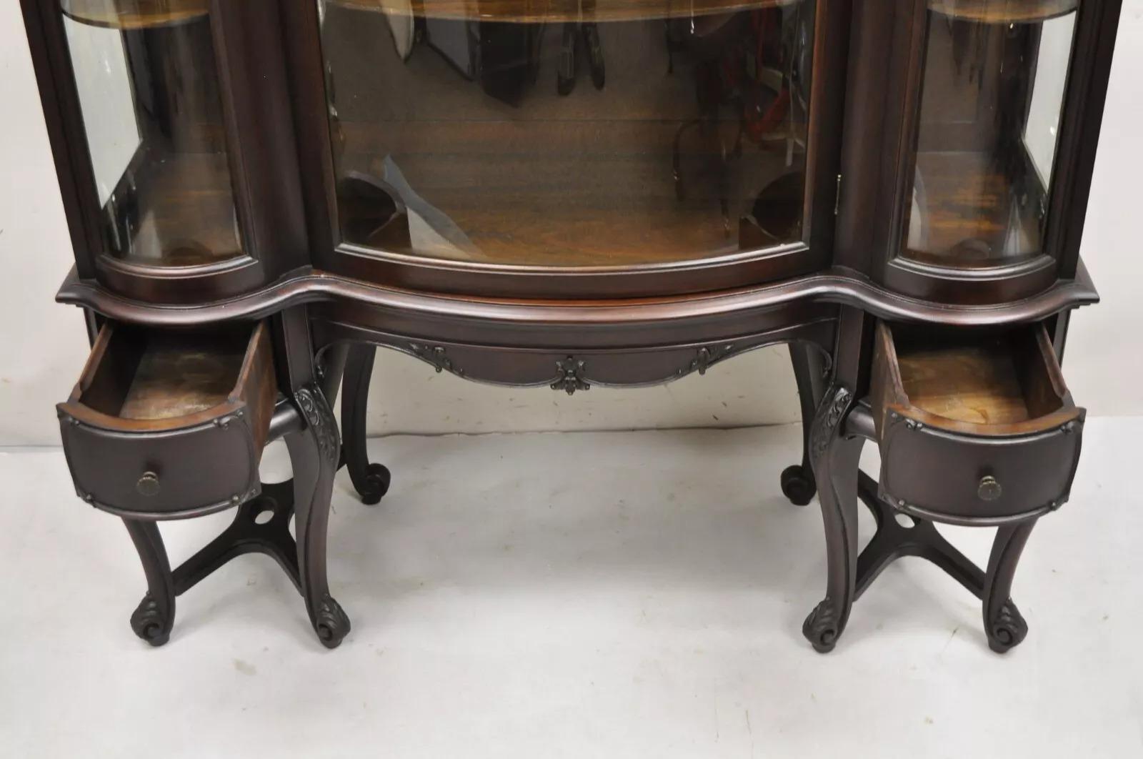 20th Century Antique French Renaissance Dark Walnut Triple Bowed Glass China Cabinet For Sale