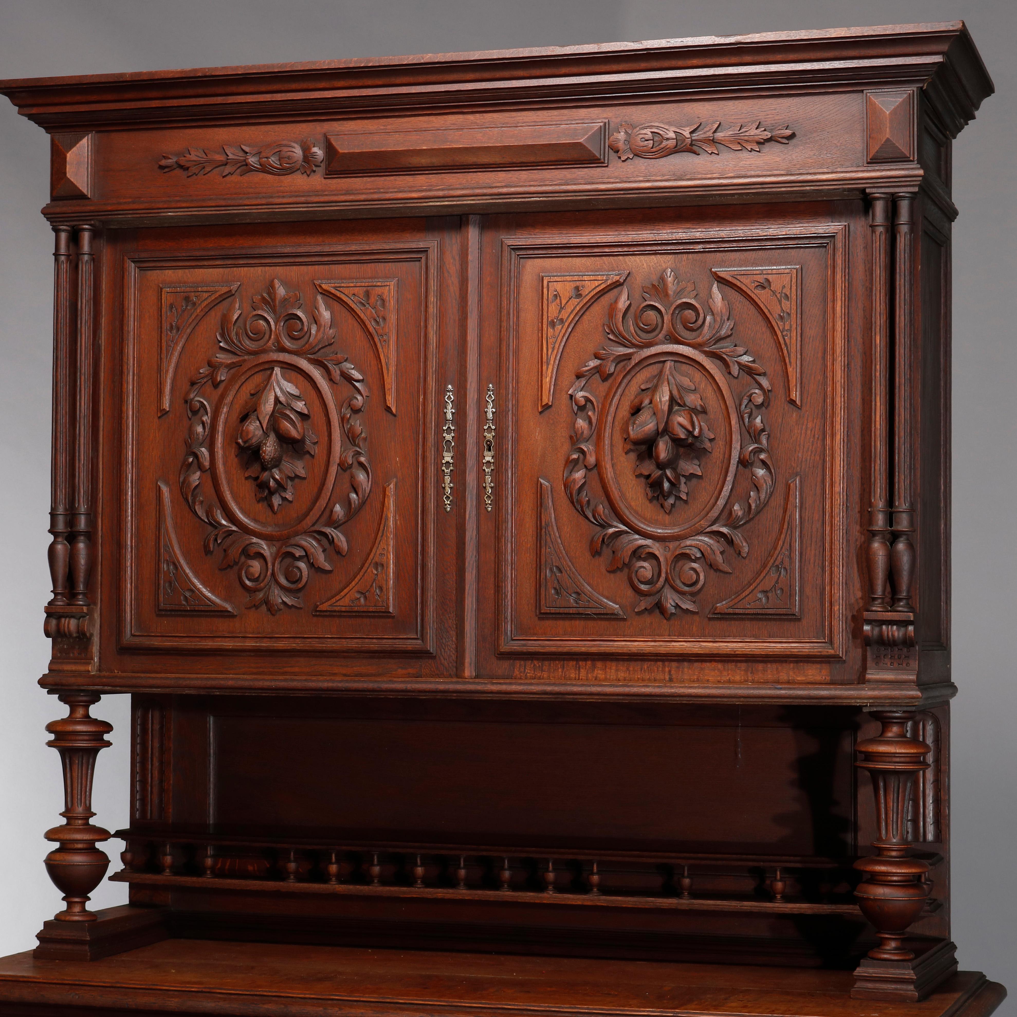 Antique French Renaissance deeply carved walnut court cupboard with gallery, scroll, gadroon, pyramidal, foliate and nut decoration, 19th century

Measures: 87