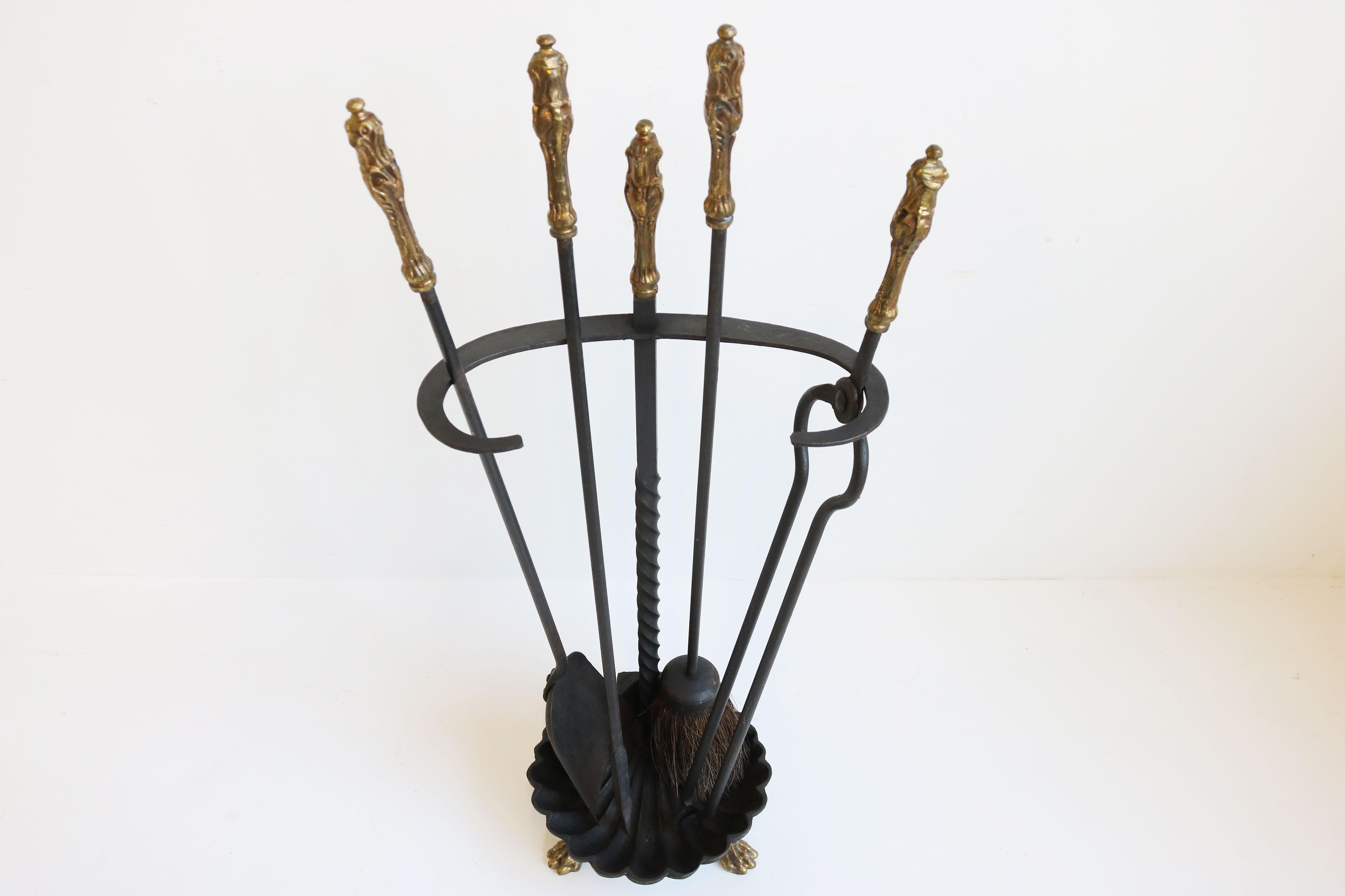 Gorgeous antique French fireplace set 19th century Renaissance revival 
Made out of wrought iron with brass grips & brass lion feet. Amazing details & craftsmanship. 
Decorate your fireplace with this rare antique set practical & gorgeous. 
Very