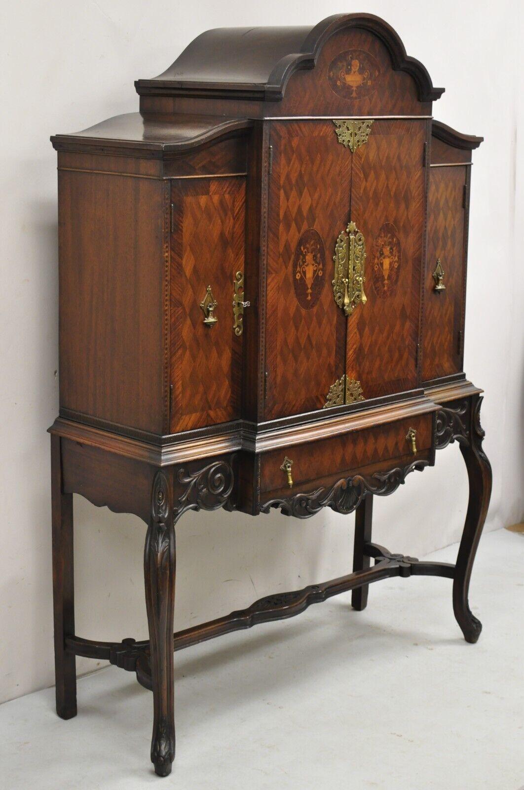 Antique French Renaissance Carved and Inlaid Walnut Record China Cabinet Curio. Item features brass hardware, beautiful inlay, raised on carved legs with stretcher support, 4 swing doors and 1 drawer. Item was originally a radio/record cabinet with