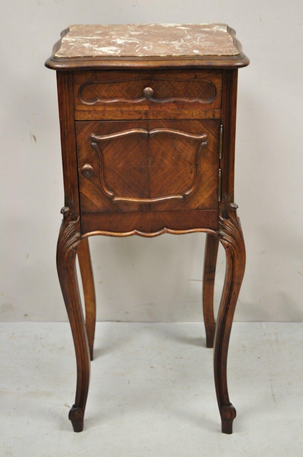 Antique French Renaissance Louis XV Style Marble Top Humidor Nightstand. Item features an inset rouge marble top, beautiful wood grain, 1 swing door, 1 dovetailed drawer, cabriole legs, probably had porcelain or marble interior at some point. Circa