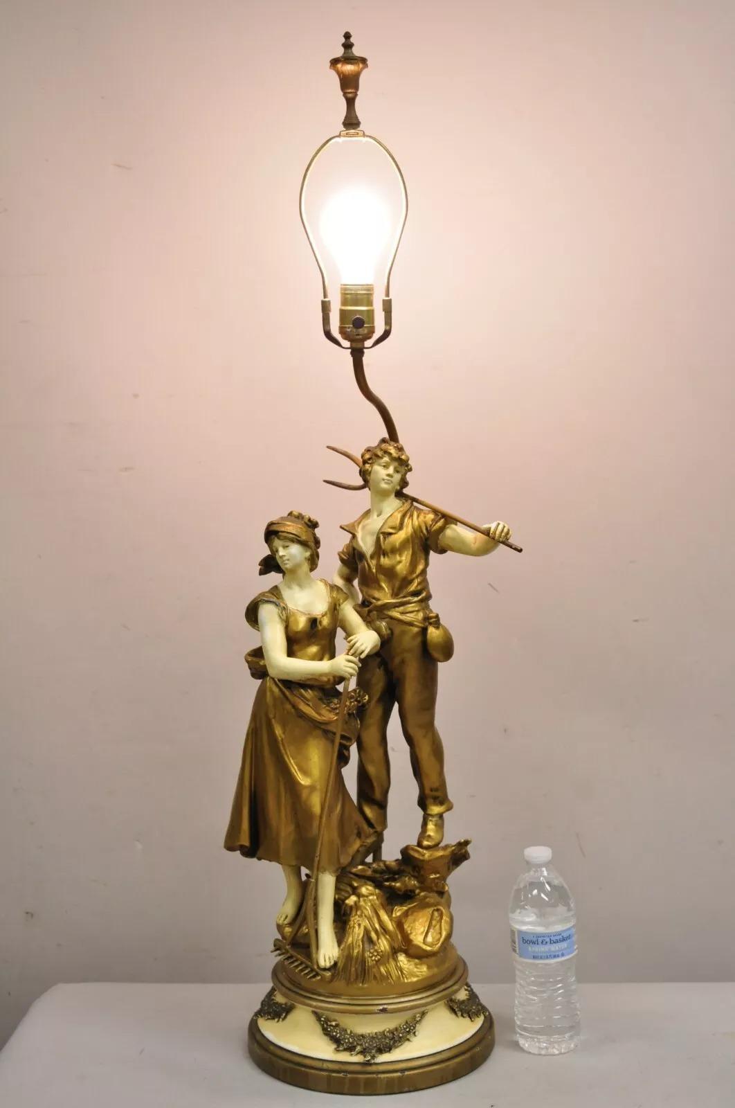 Antique French Renaissance Moreau Figural Metal Table Lamp, Wife & Farmer. Circa Early 20th Century. Measurements: 39.5