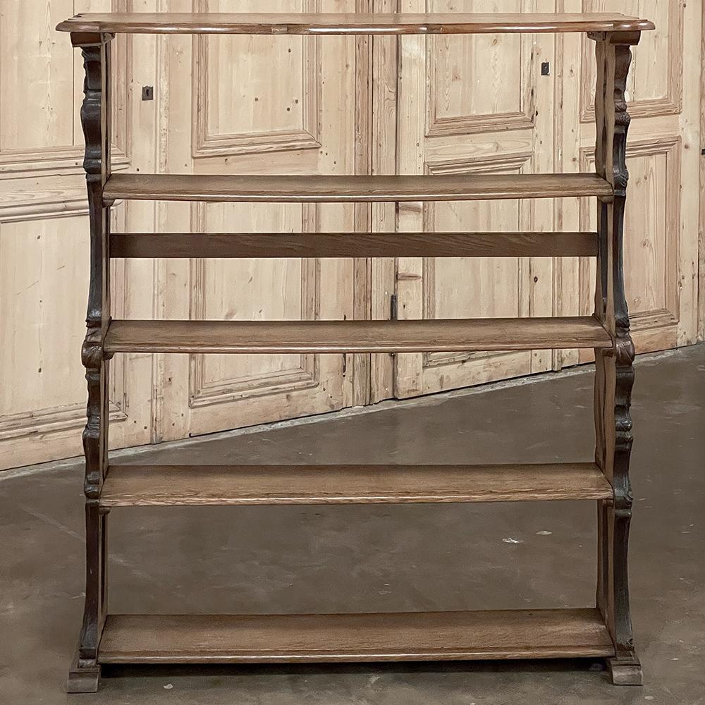 Antique French Renaissance Open Bookcase is the perfect choice for a compact, shallow bookshelf that takes up a minimal amount of floor space yet is capable of holding dozens of books for your instant access! Hand-crafted from solid old-growth oak