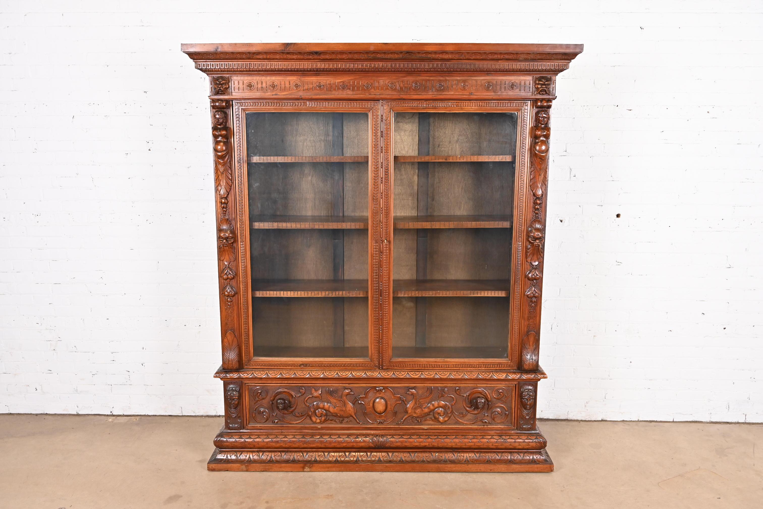 Rinascimento Antique French Renaissance Ornate Carved Walnut Bookcase Cabinet, CIRCA 1900 in vendita