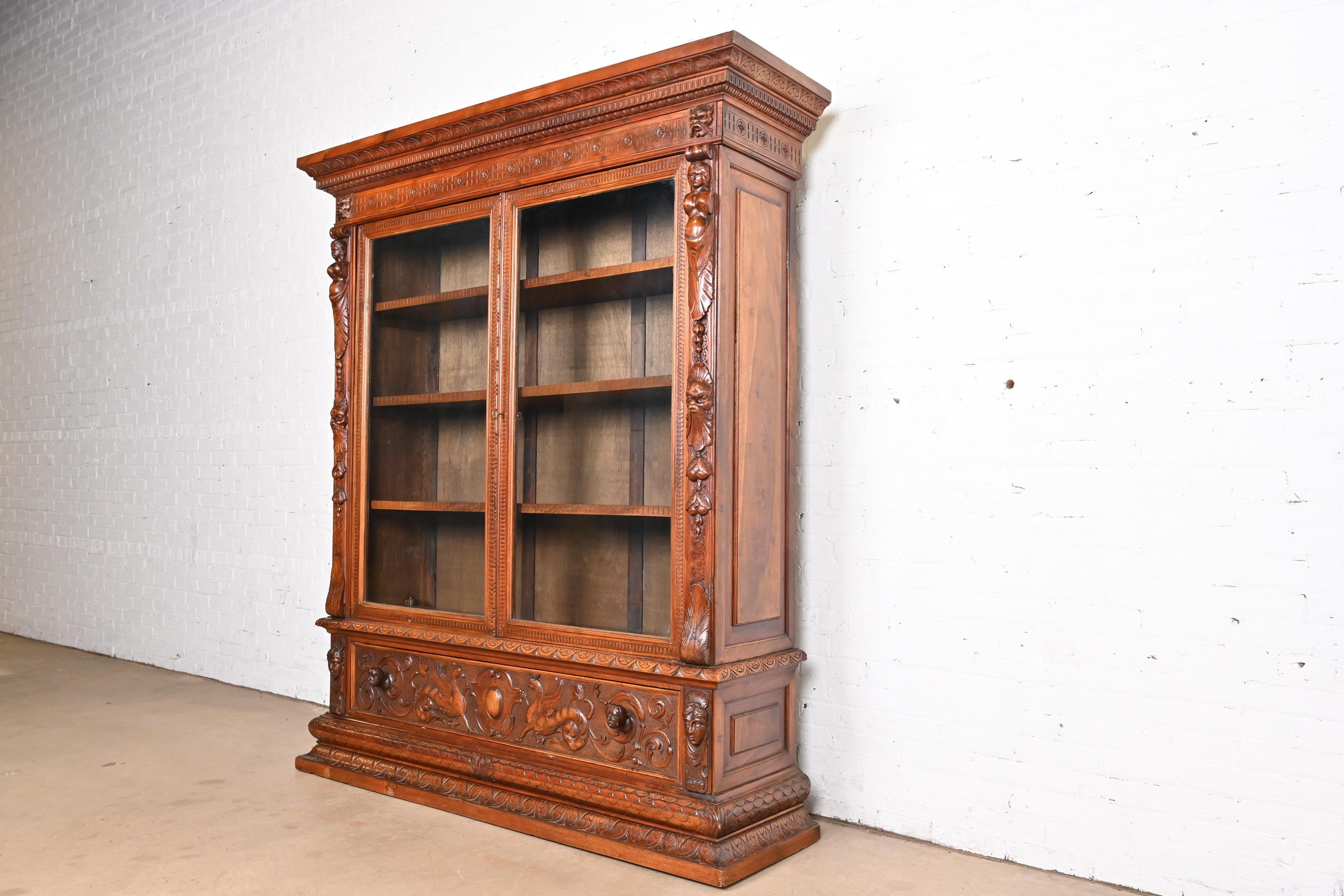 Francese Antique French Renaissance Ornate Carved Walnut Bookcase Cabinet, CIRCA 1900 in vendita