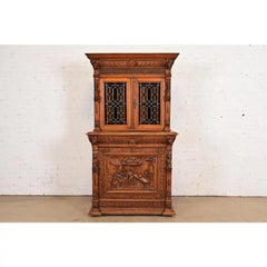 Antique French Renaissance Revival Carved Oak Breakfront Bookcase, Circa 1890s