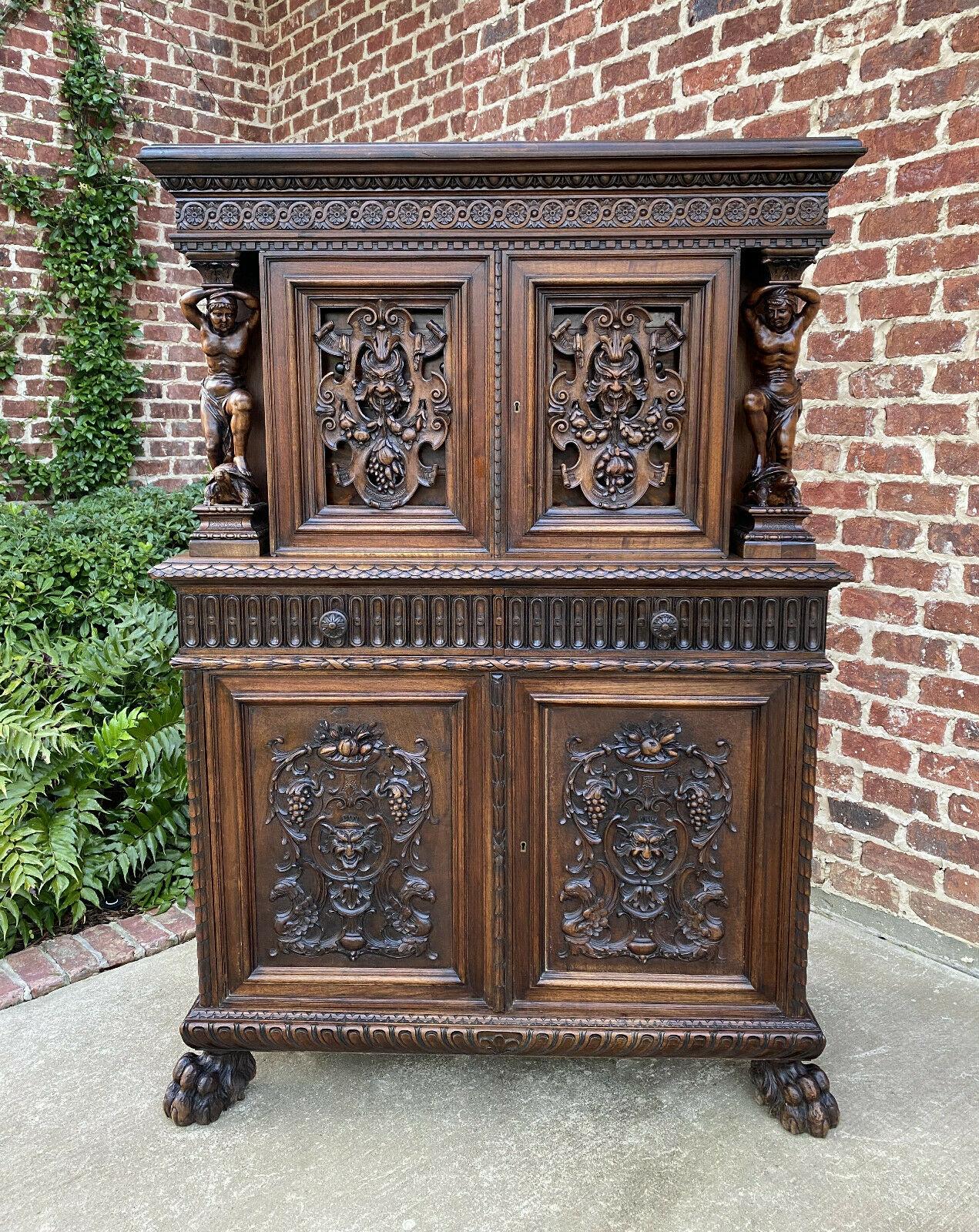 Superb antique French walnut Renaissance revival cabinet, cupboard, jewelry cabinet or apothecary~~neo classical male figures standing on turtles~~rare~~c. 1880s

This is a must see~~rare 19th century commissioned piece with exquisitely carved Neo