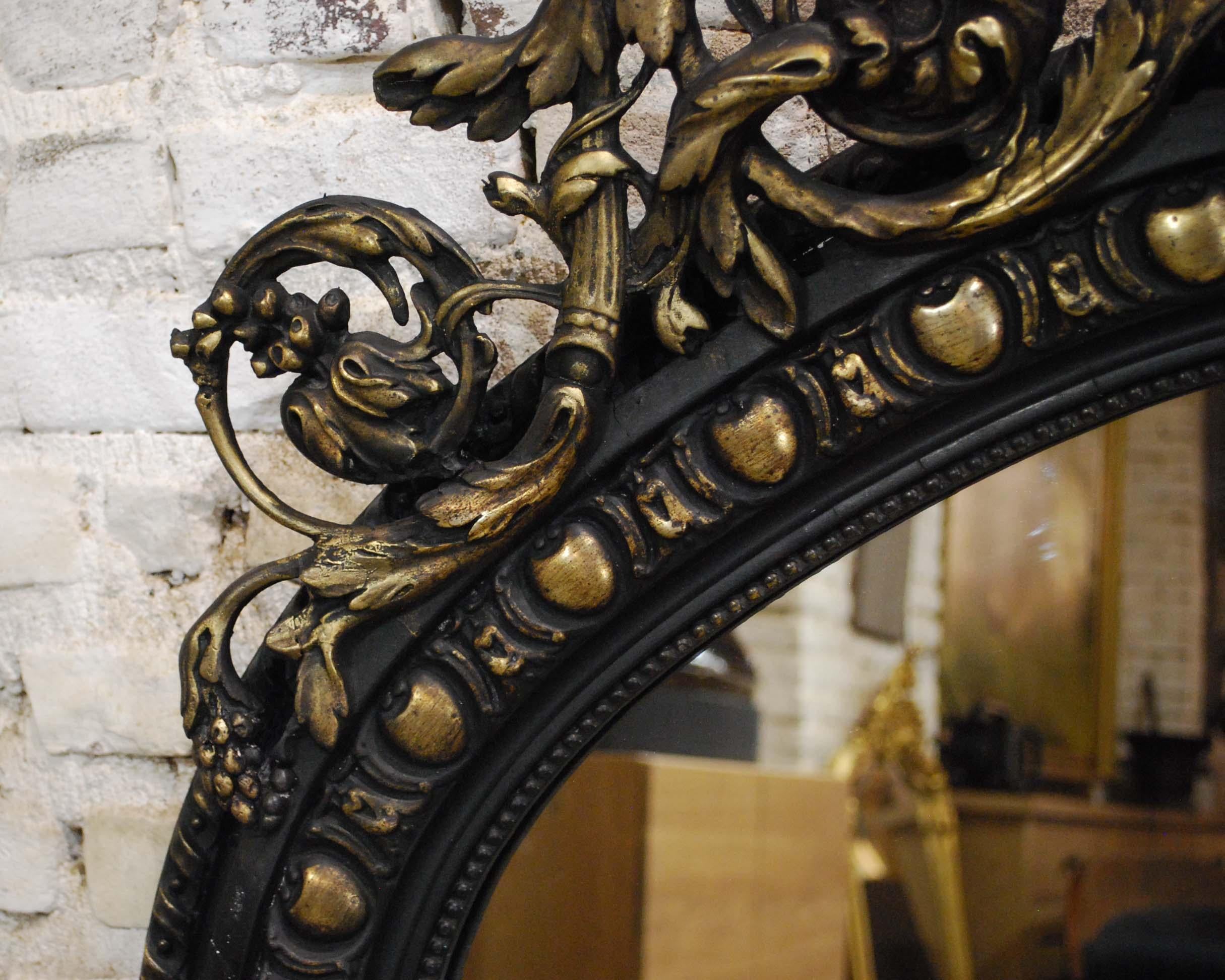 Antique French Renaissance Style Black and Gold Mirror with Carved Ornaments In Good Condition In Casteren, NL