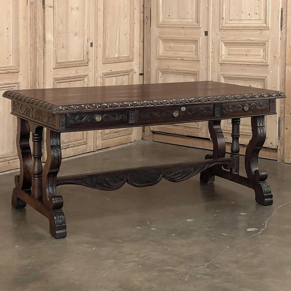 Antique French Renaissance walnut desk ~ Bureau plat was found along the southern coast of France, and emulates the styles of Italian and Spanish artisans immediately to the east and west, with lyre-shaped, scrolled legs on each end centered with a