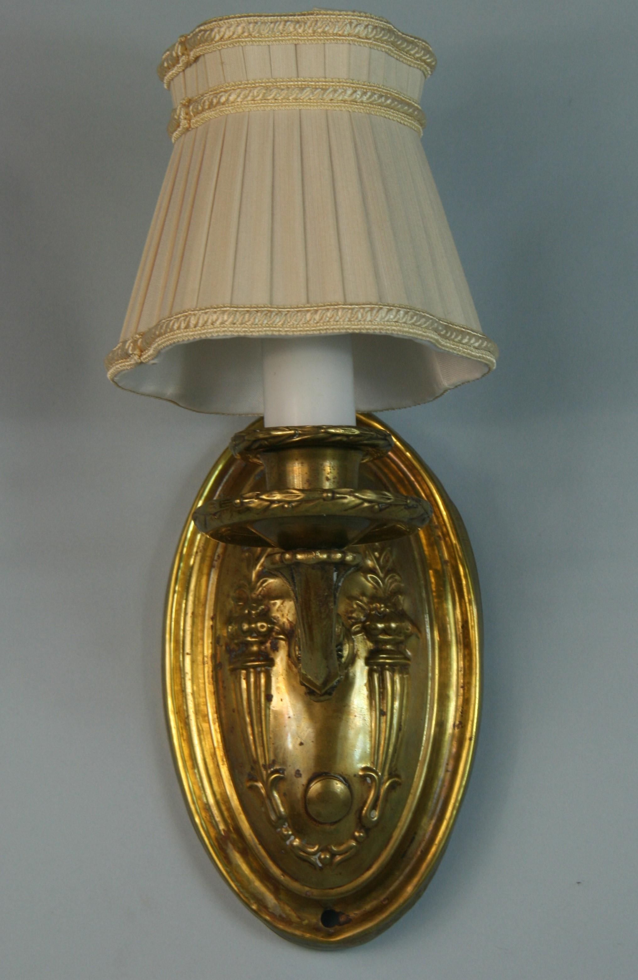 1604 Antique pair of brass repousse sconces with custom shade
Takes 40 watt max Edison based bulb
Rewired.
