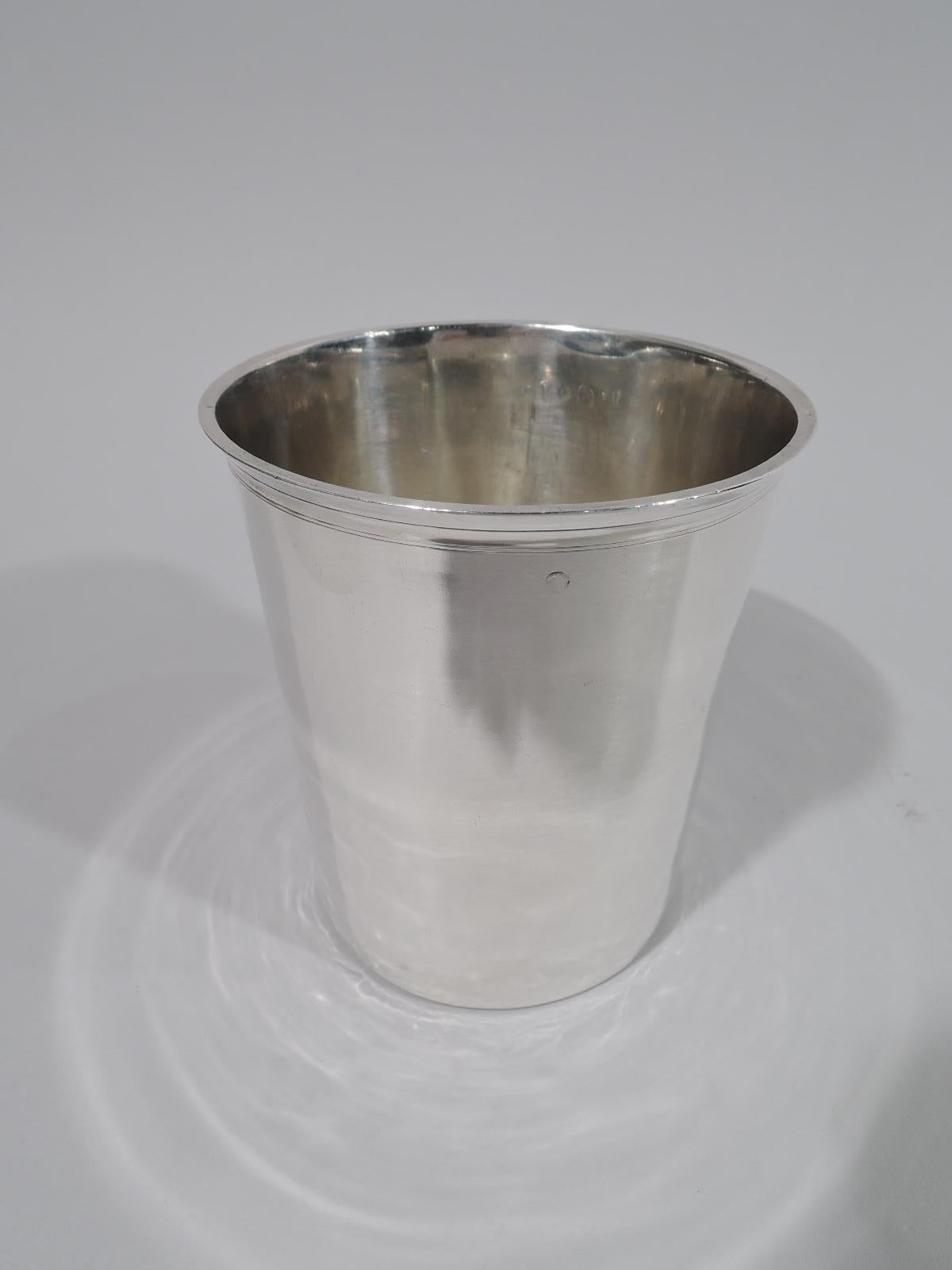French Restauration silver beaker, circa 1820. Straight and tapering sides. and flared and flat rim. Engraved near rim are the initials L.G.J. Fully marked with Hippocrates head and maker’s stamp for Theodor Tonnelier, who was active in Paris