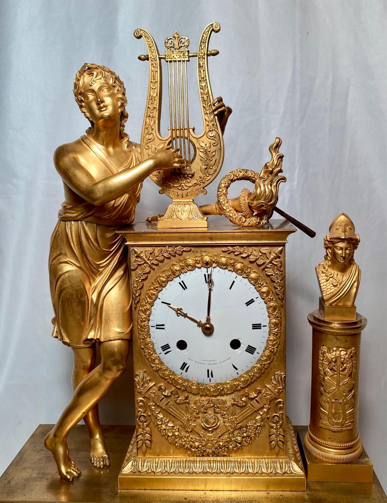 Antique French restoration period finest detailed ormolu clock, Circa 1830.