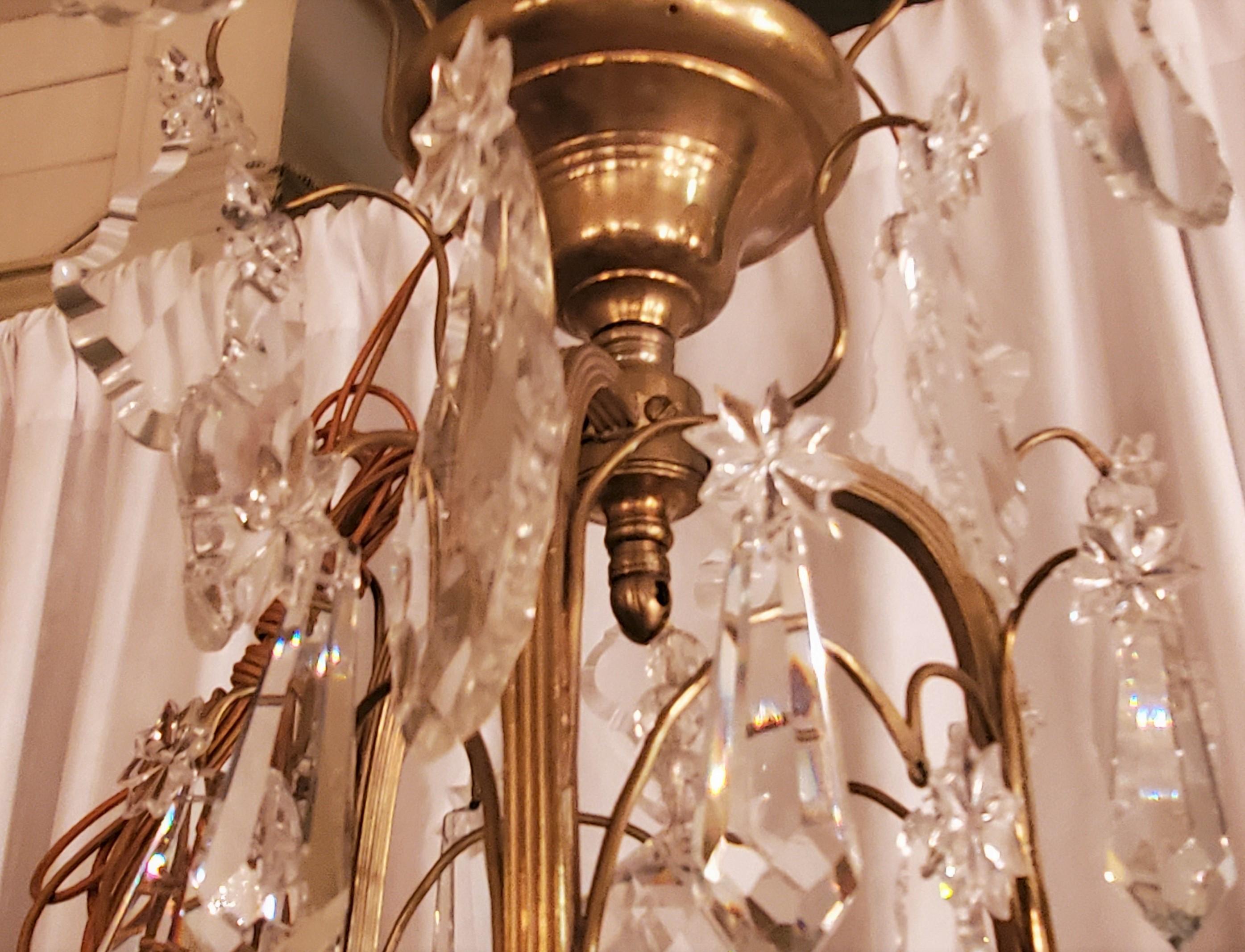 Antique French richly draped Baccarat crystal and ormolu chandelier. 10-light.