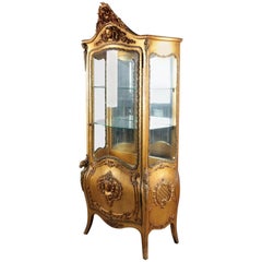 Antique French Rococo Bow Front Carved Giltwood and Ormolu Mirror Back Vitrine