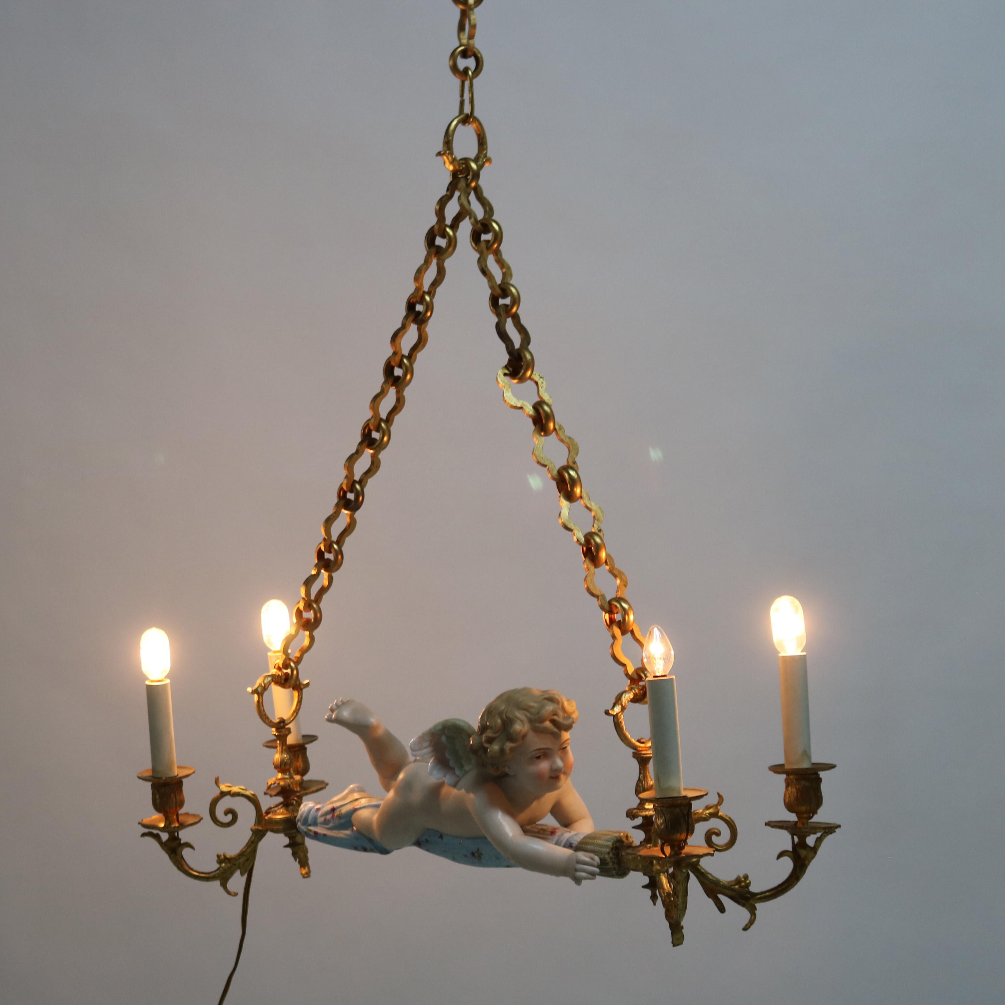 Ancienne suspension rocococo française en porcelaine biscuit et bronze doré représentant un chérubin, vers 1920

Dimensions : 32 