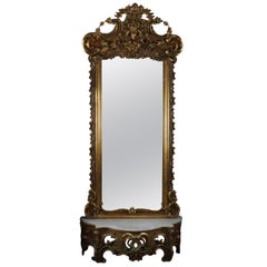 Antique French Rococo Giltwood and Marble Scroll and Foliate Pier Mirror